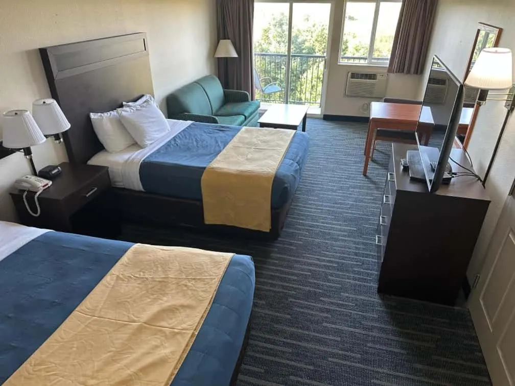 Bed in Coratel Inn and Suites By Jasper Ocean Shores