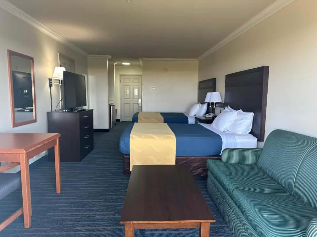 Bed in Coratel Inn and Suites By Jasper Ocean Shores