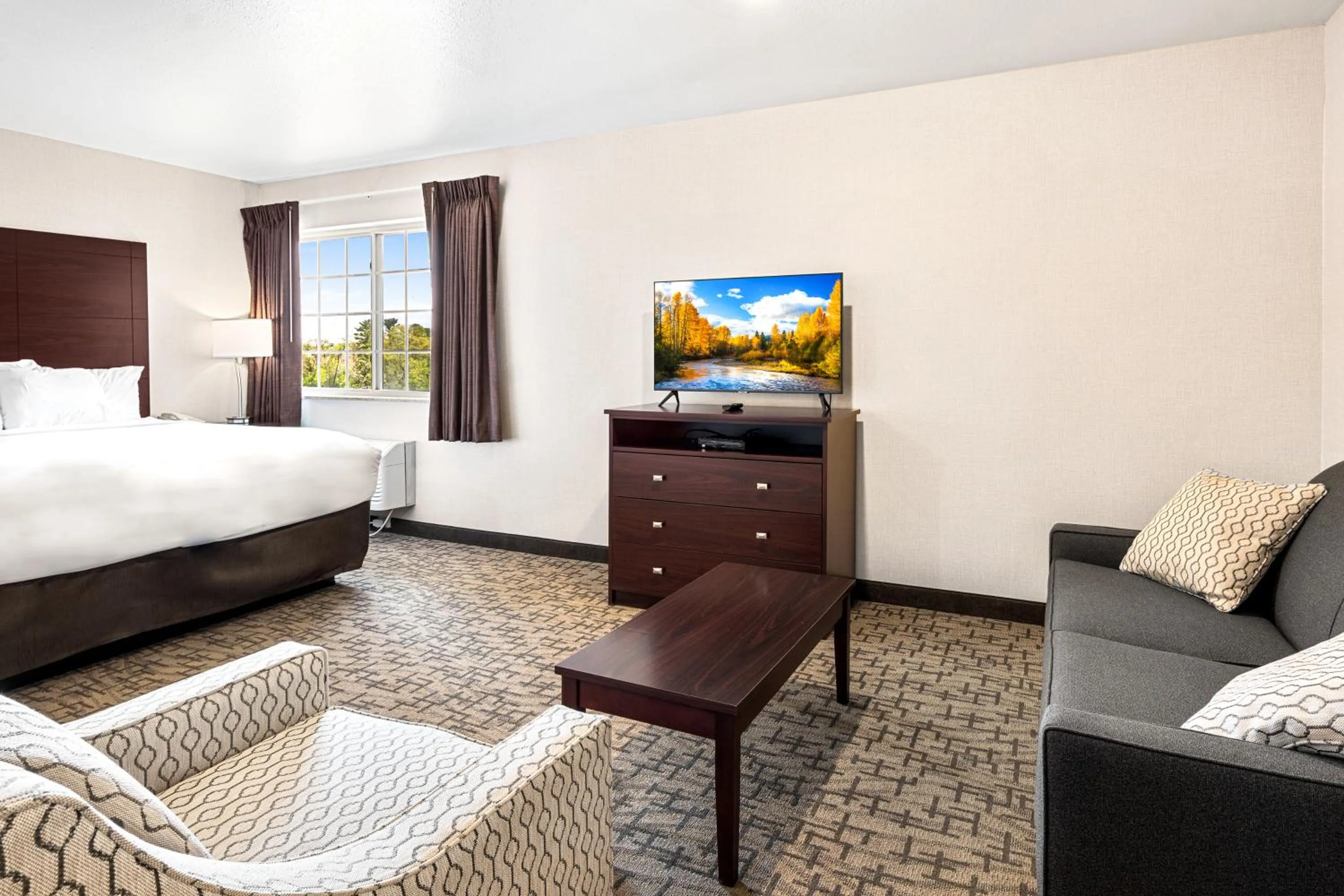 Photo of the whole room, Bed in Boarders Inn & Suites by Cobblestone Hotels - Shawano