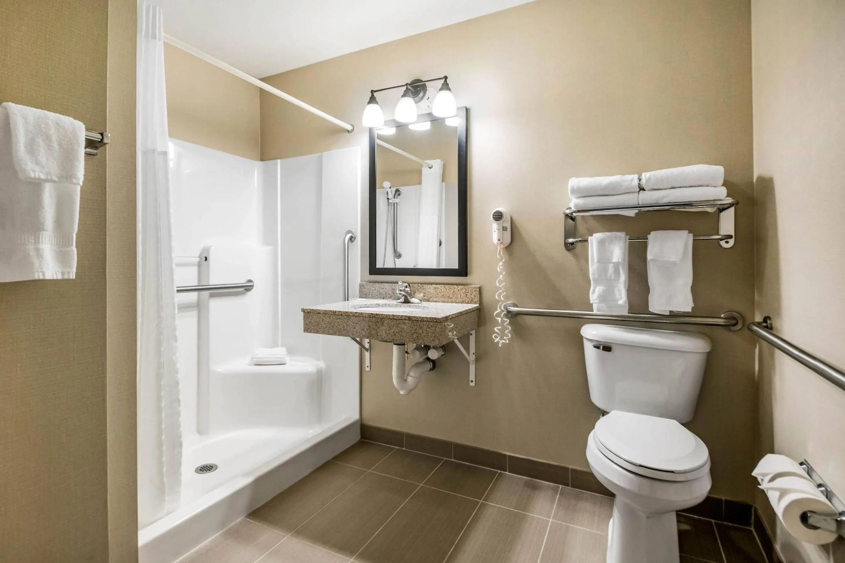 Bedroom in Comfort Suites at Par 4 Resort