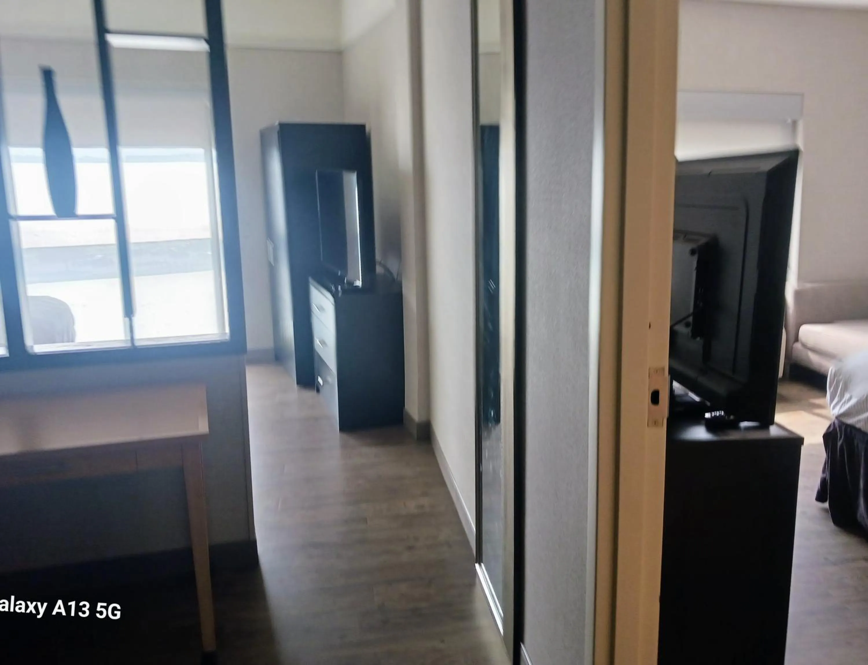 Seating area, Bed in Cambria Hotel Madison East