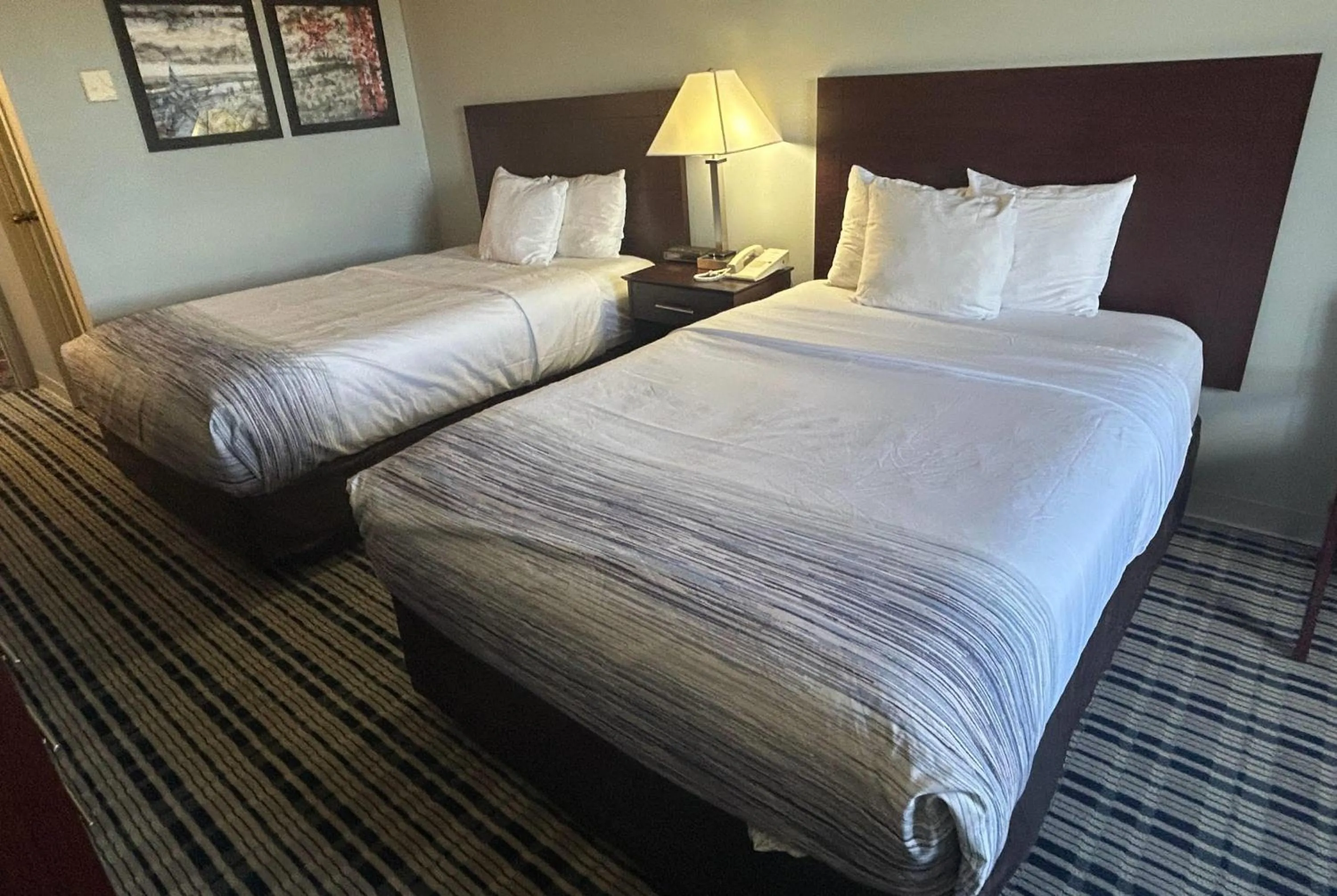 Photo of the whole room, Bed in AmericInn by Wyndham Mosinee Central Wisconsin Airport