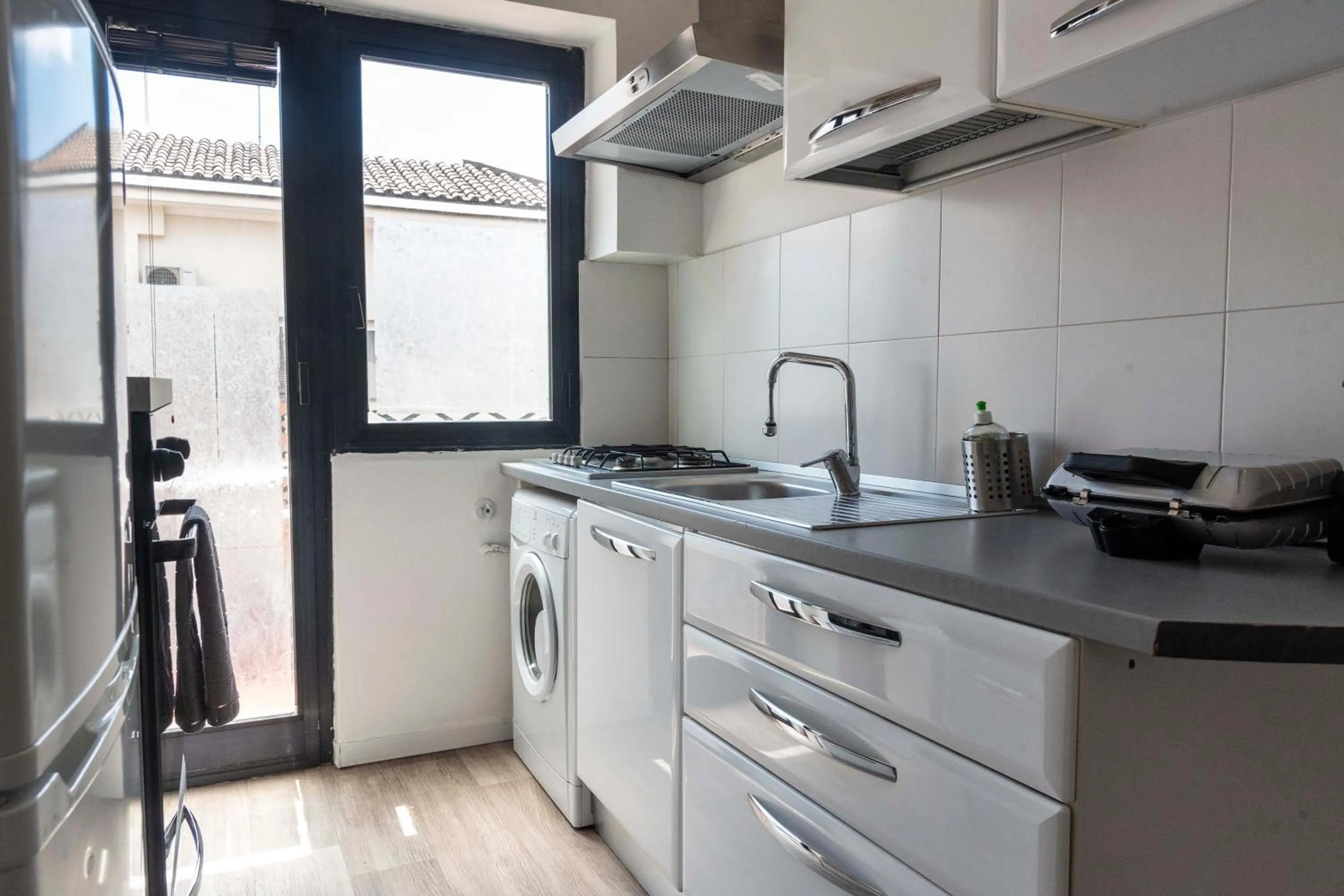 Kitchen or kitchenette in Merulana Suite S.Peter