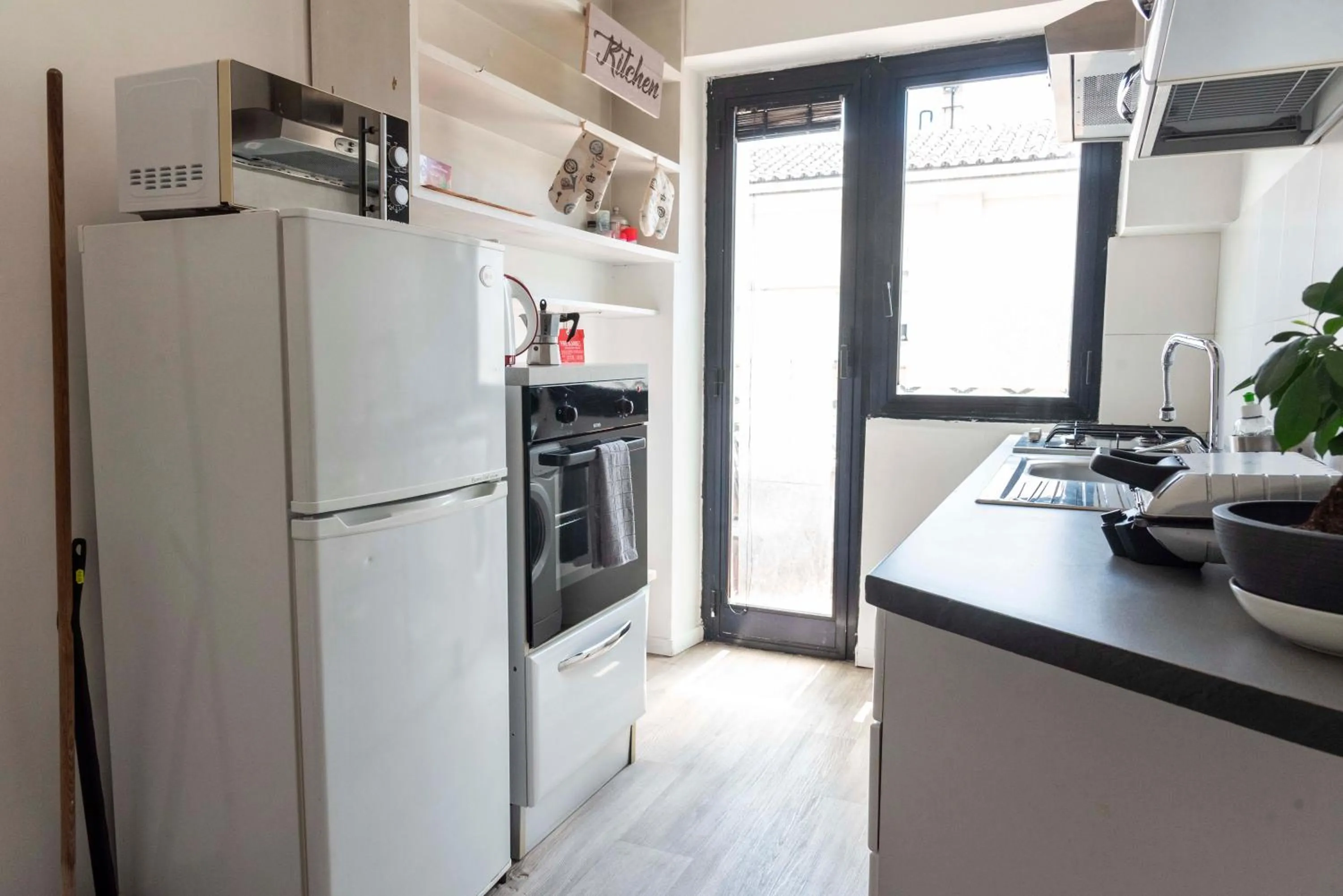 Kitchen or kitchenette in Merulana Suite S.Peter