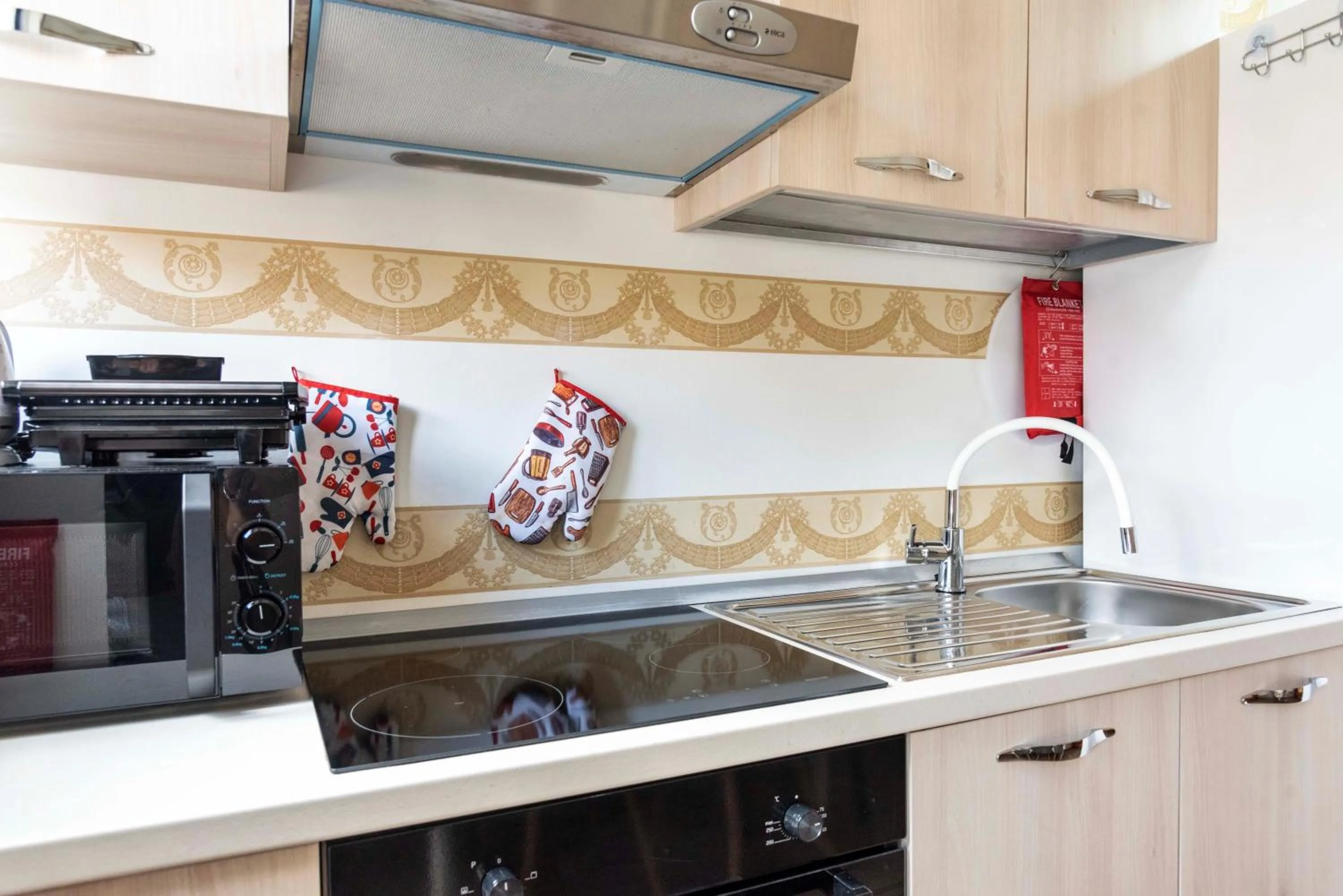 Kitchen or kitchenette in Merulana Suite S.Peter