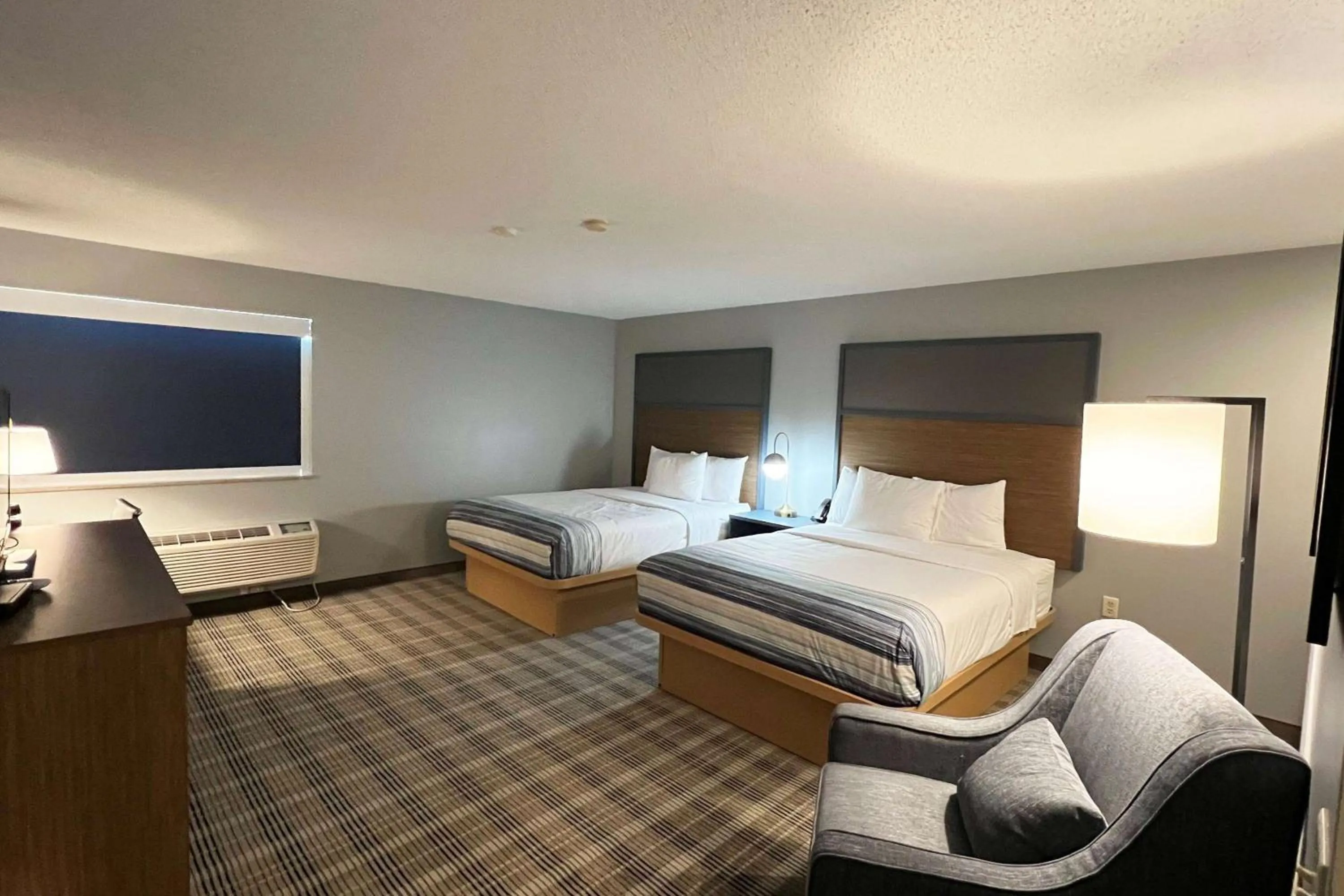 Photo of the whole room, Bed in AmericInn by Wyndham Marshfield