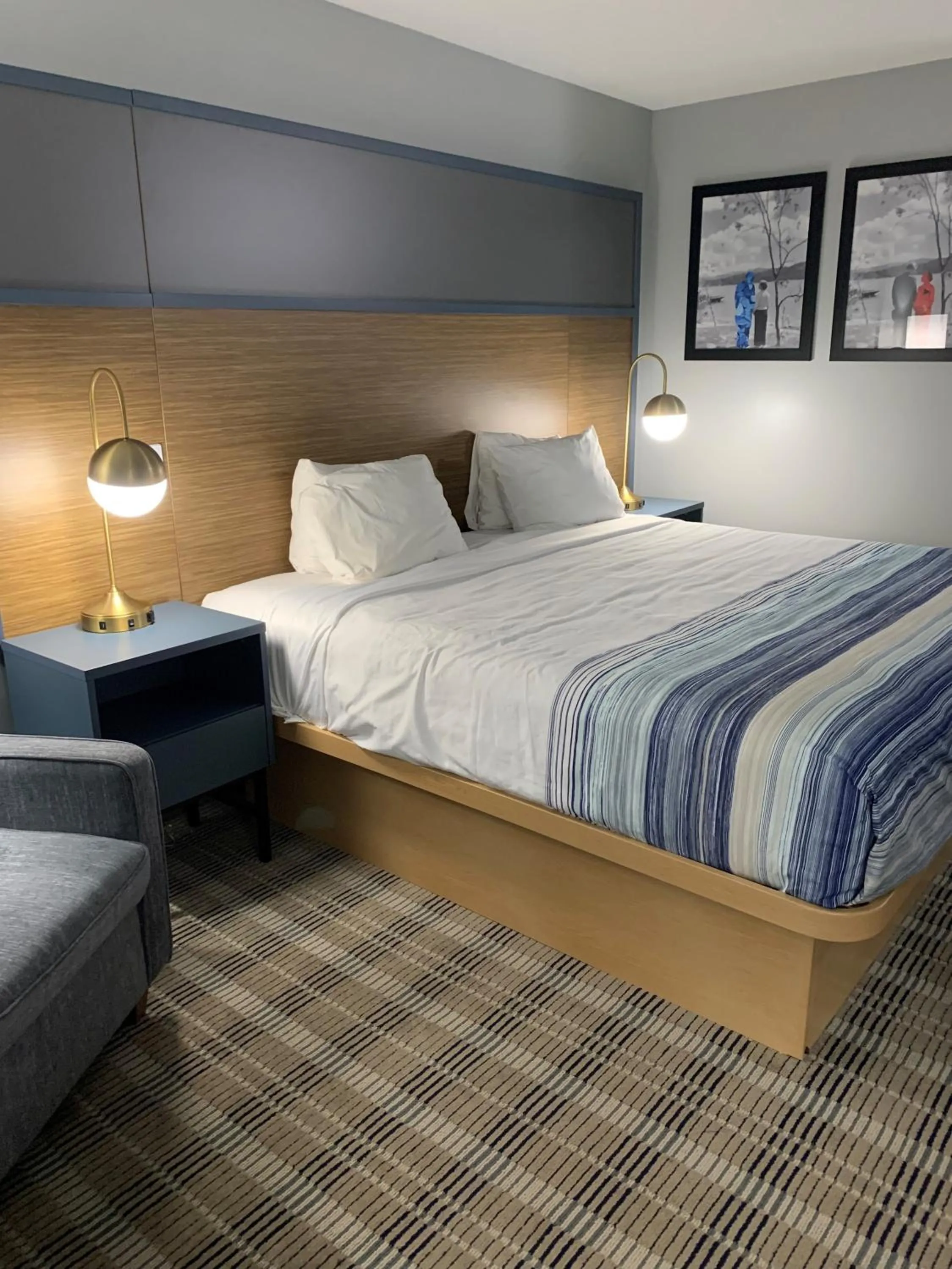 Bedroom, Bed in AmericInn by Wyndham Marshfield