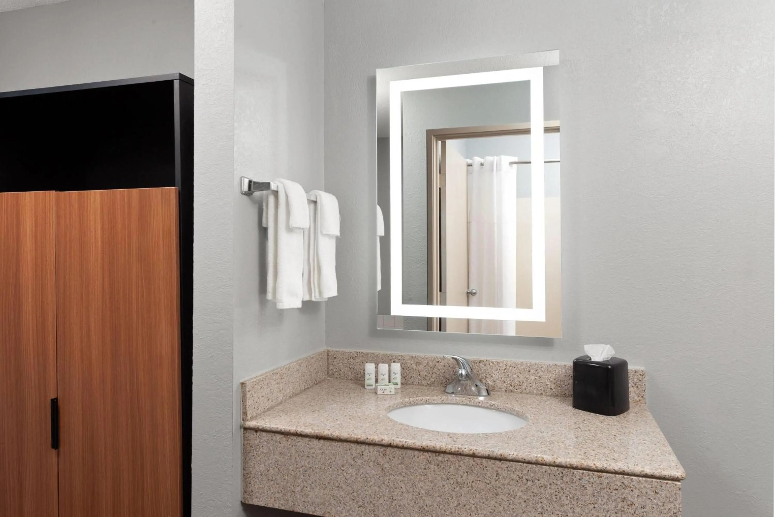 Bathroom in AmericInn by Wyndham Reedsburg