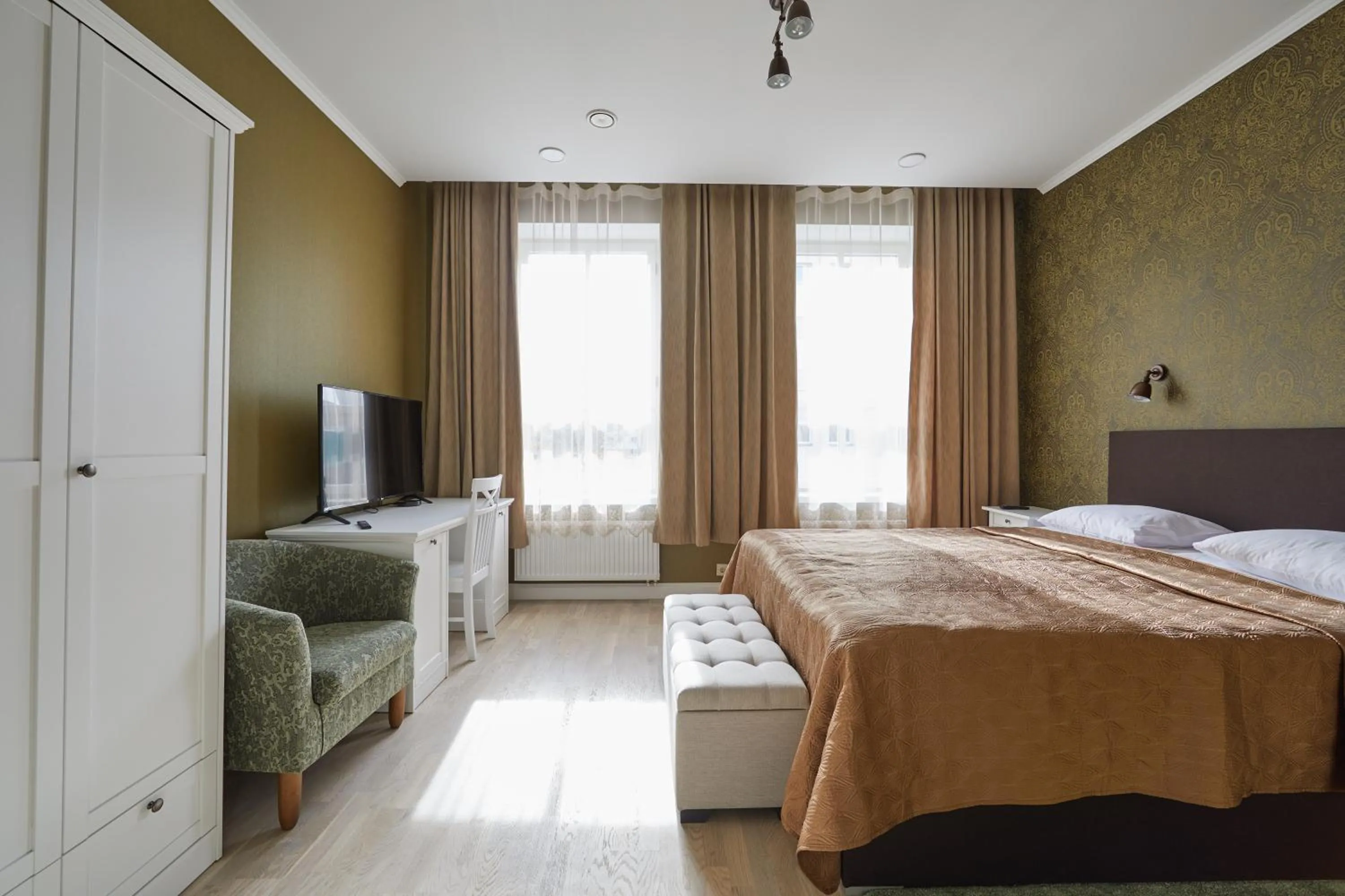 Bed in Rohuaia Apartments