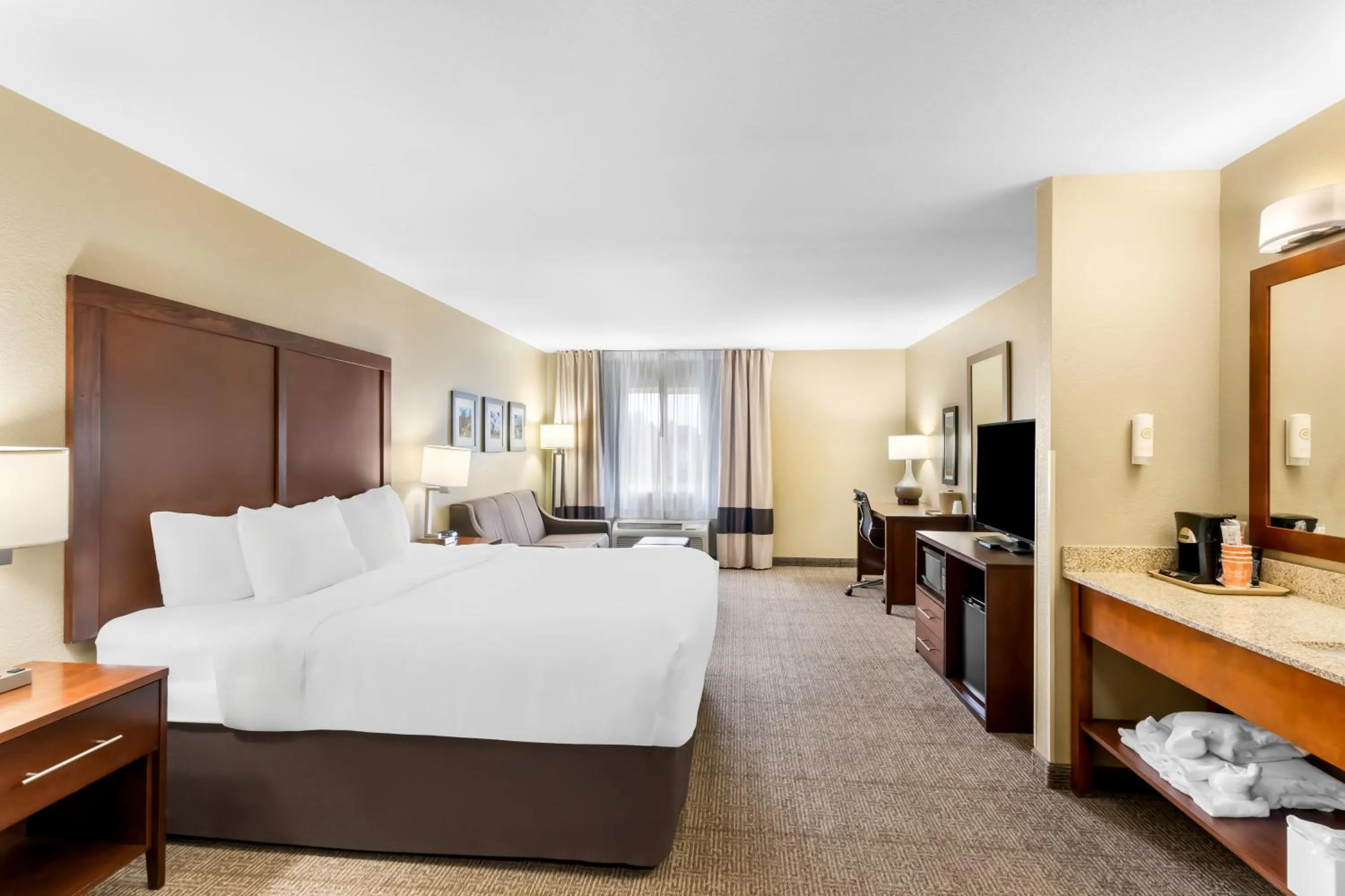 Bed in Comfort Inn & Suites Near University of Wyoming