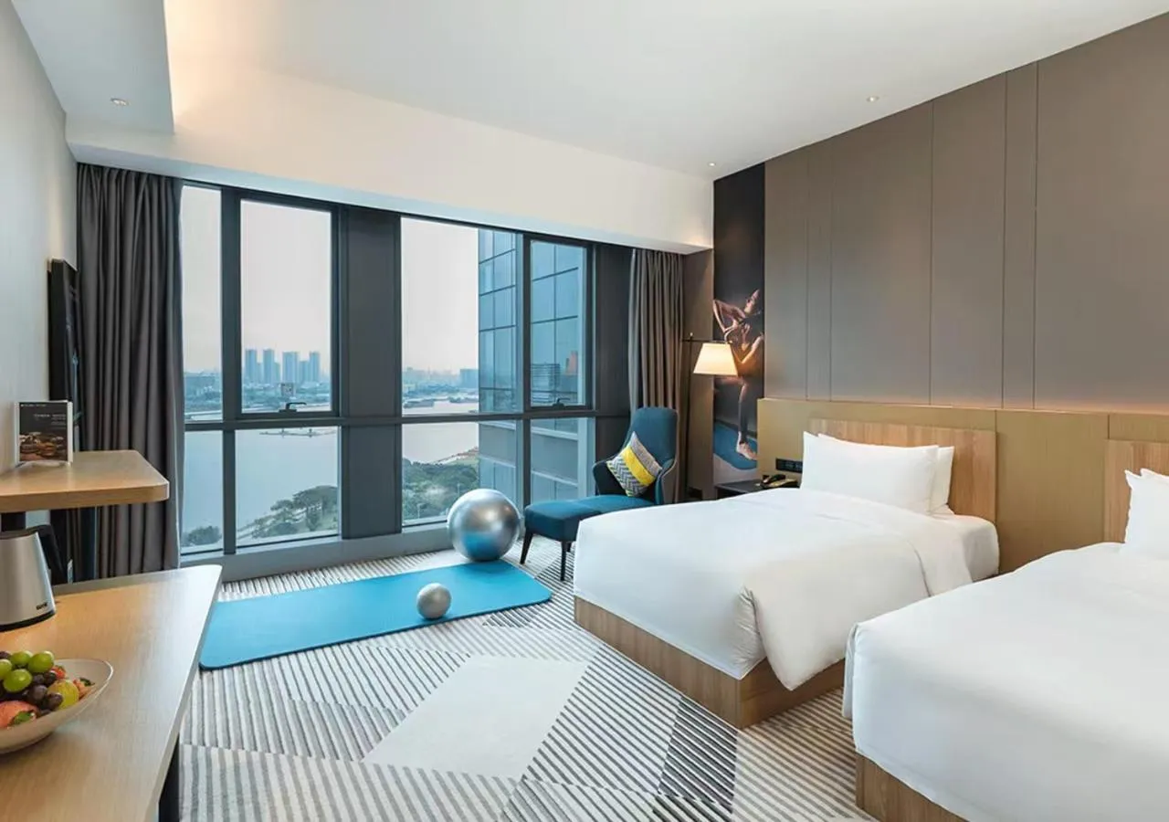 Bed in La Yarda Hotel Guangzhou