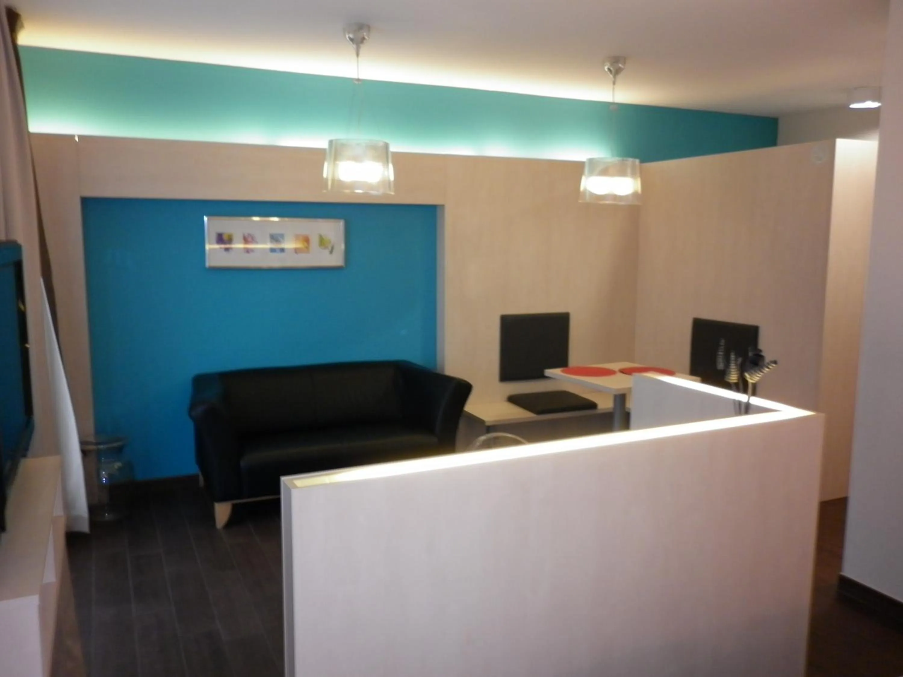 Living room in Ibis Styles La Louvière