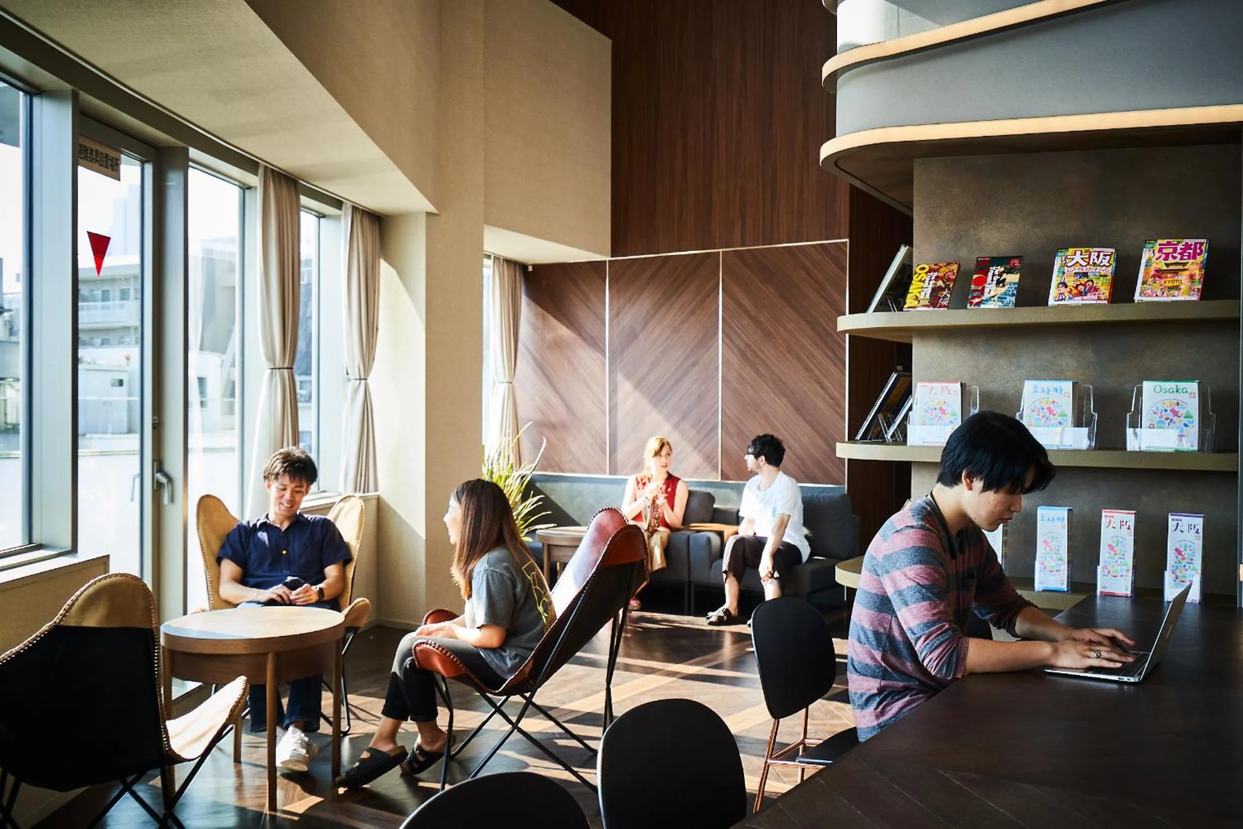 Communal lounge/ TV room in &AND HOSTEL HOMMACHI EAST