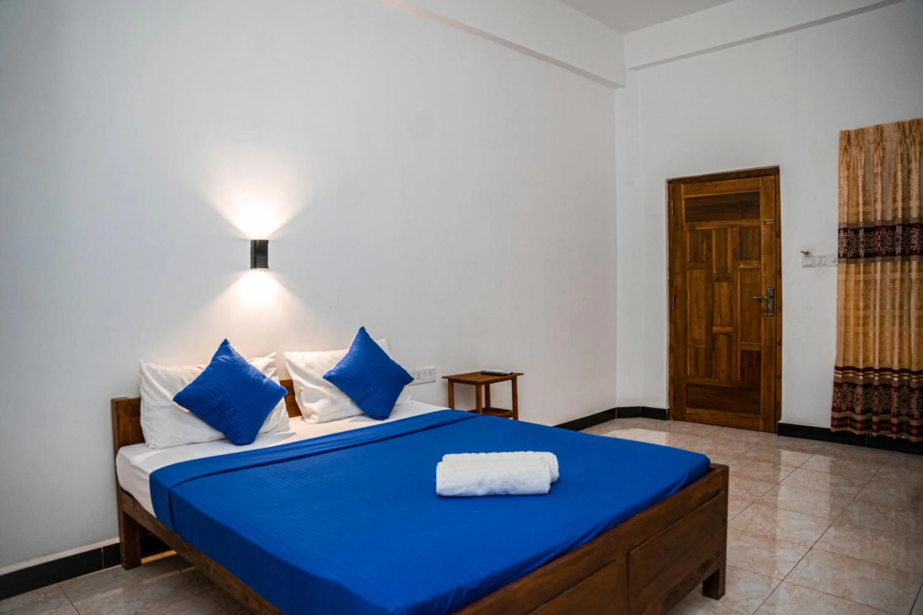 Bed in Theevanni Resort