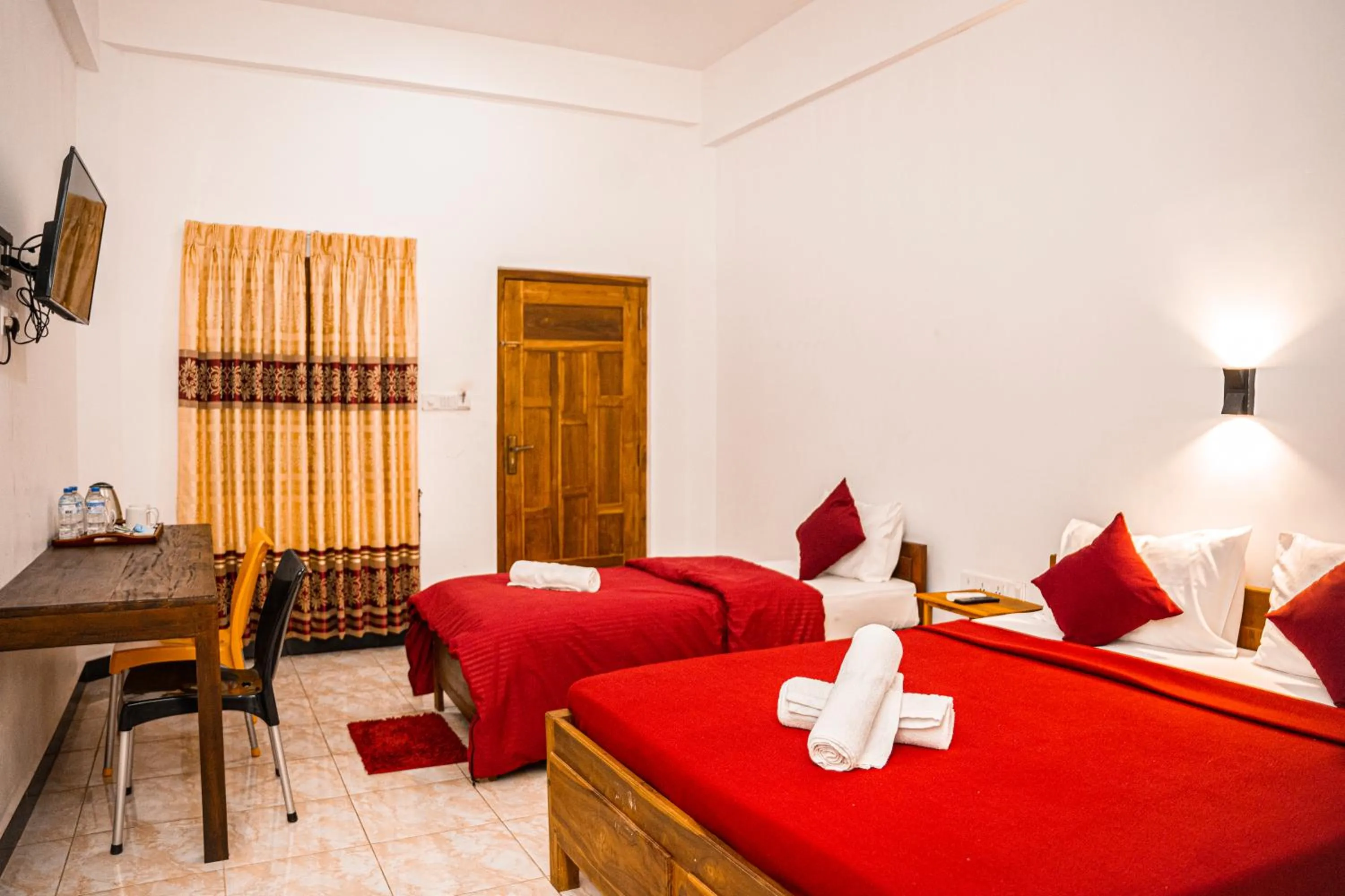 Bed in Theevanni Resort