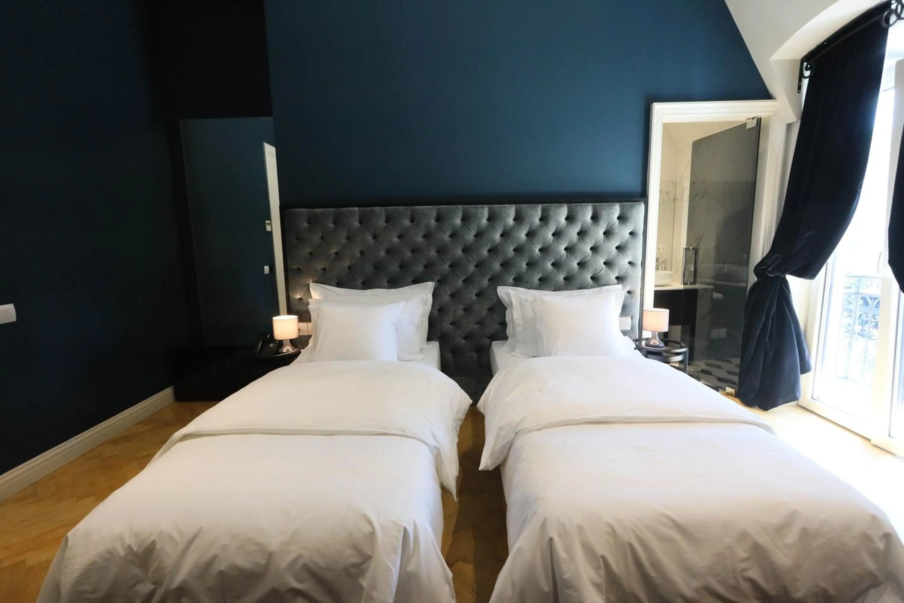 Bed in Arté Boutique Hotel