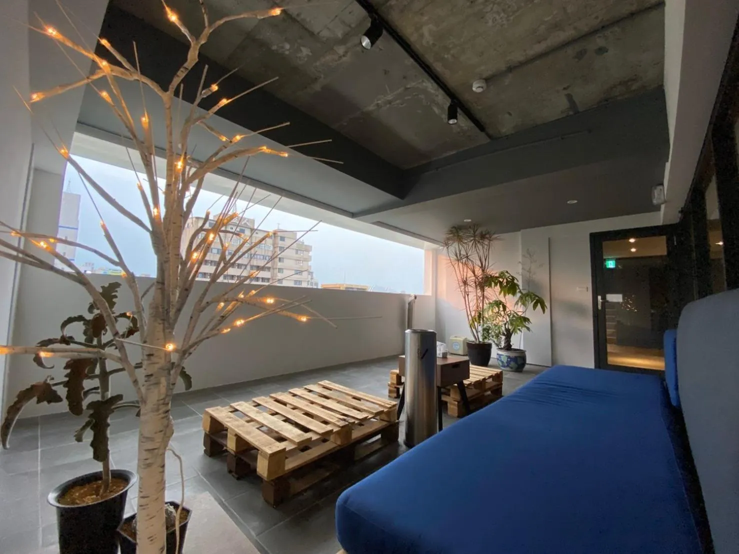 Seating area, Bed in Doudian DDiNN Hotel