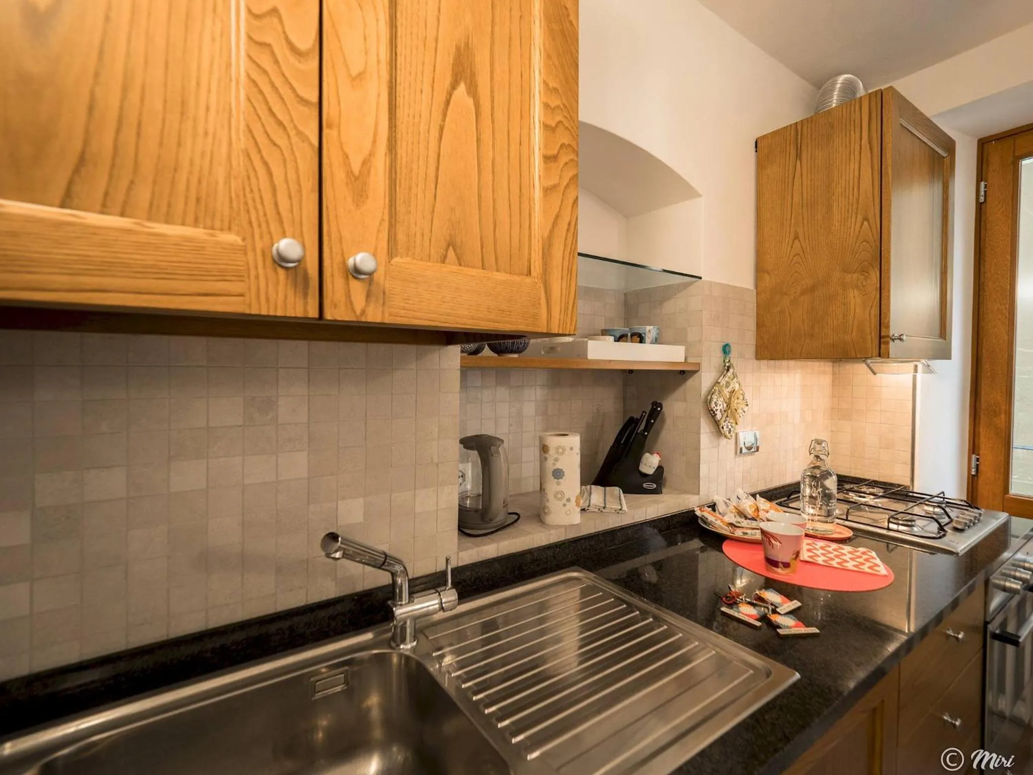 Kitchen or kitchenette in Ventu de Ma Studios & Rooms