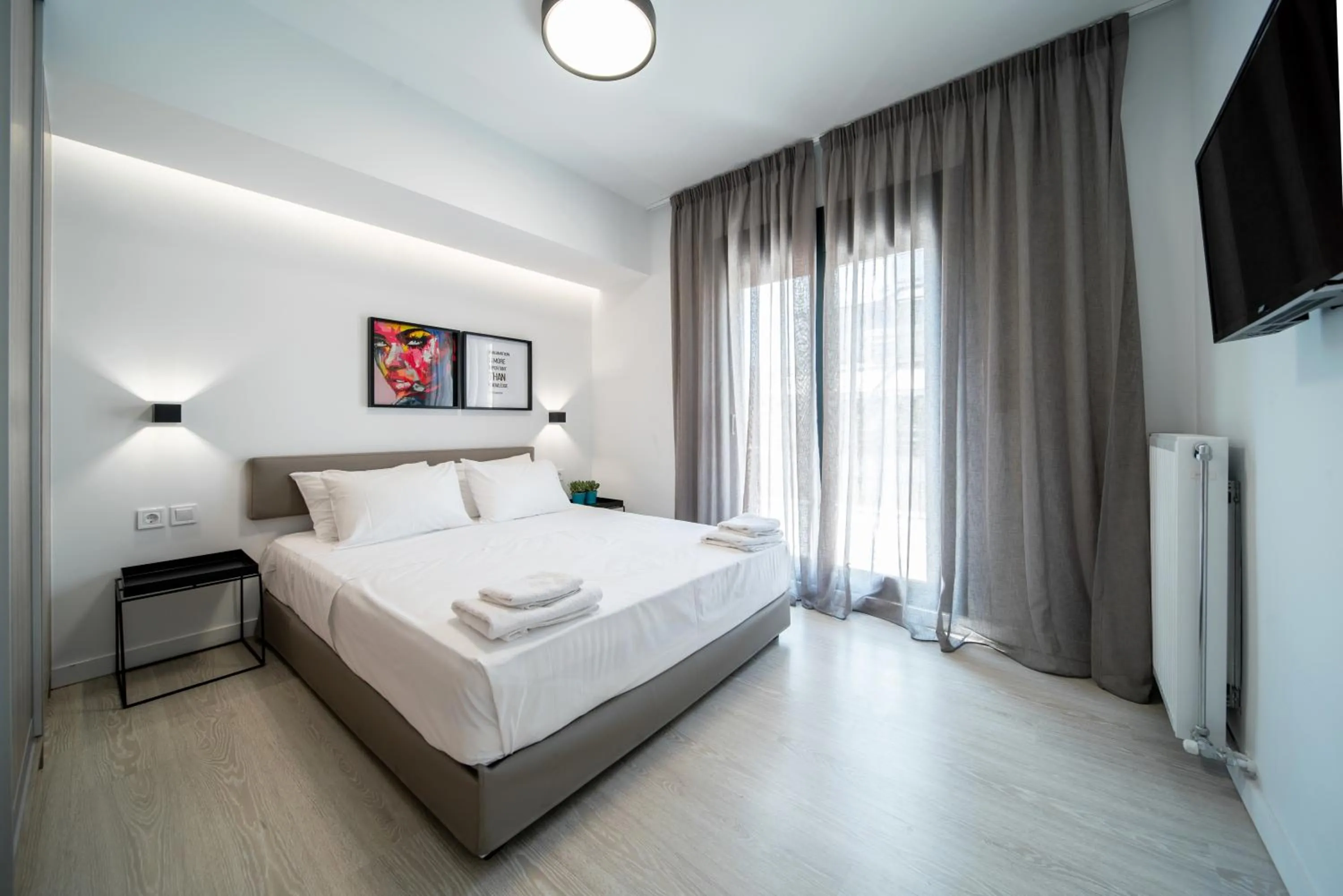 Bed in Heritage Boutique Apartments