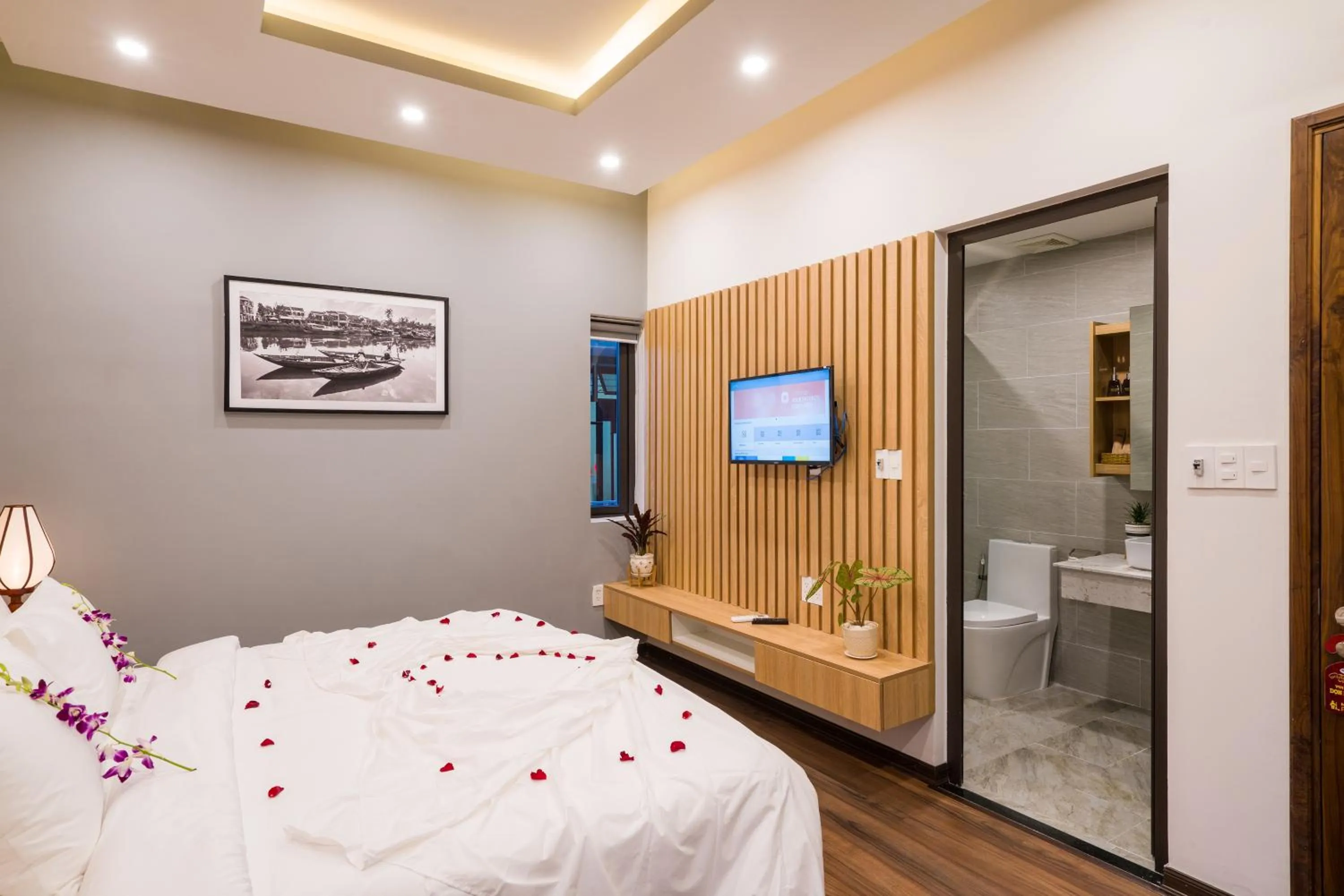 Photo of the whole room, Bed in Hoi An Grace River Villa
