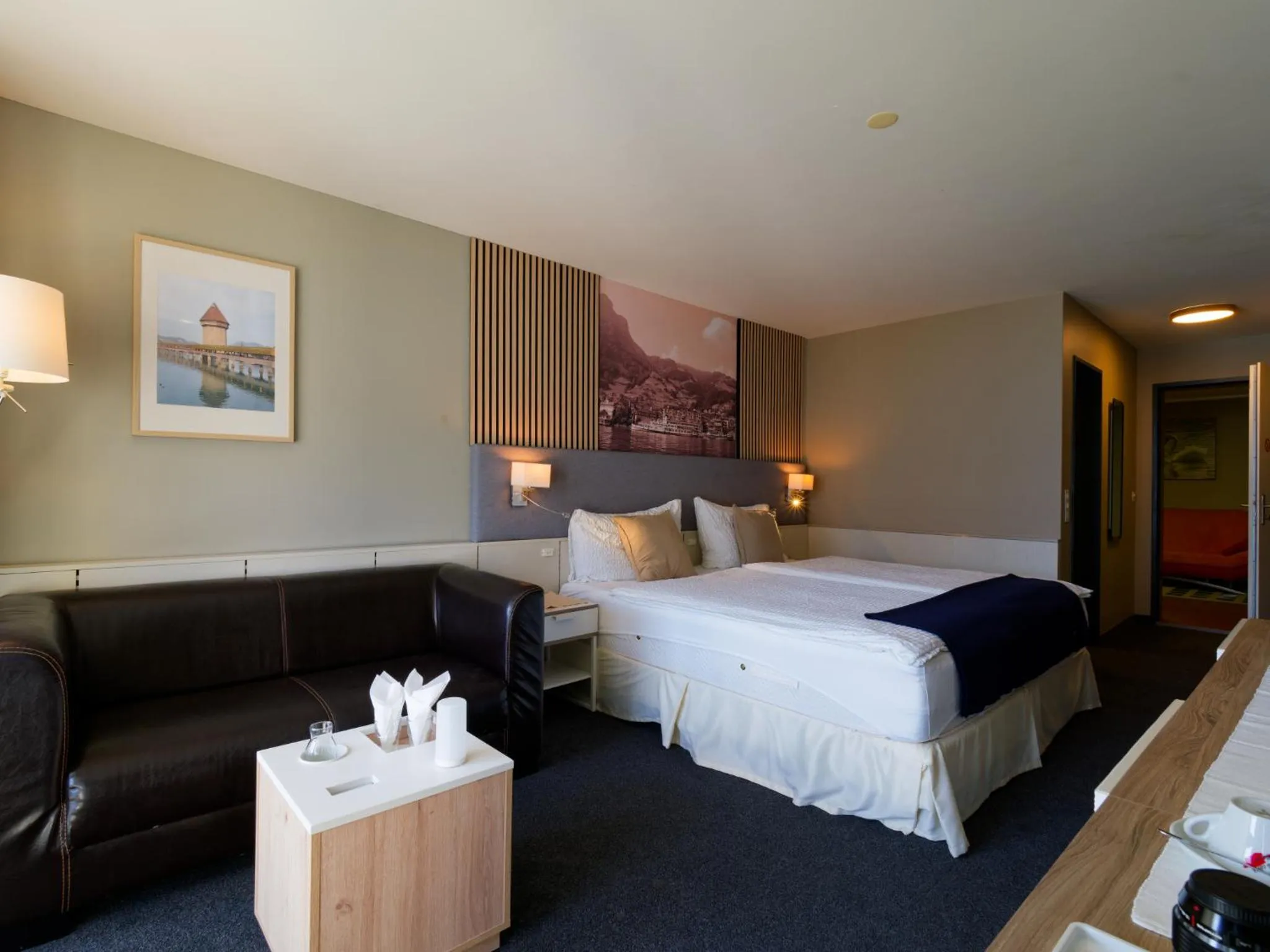 Bed in Seehotel Riviera at Lake Lucerne