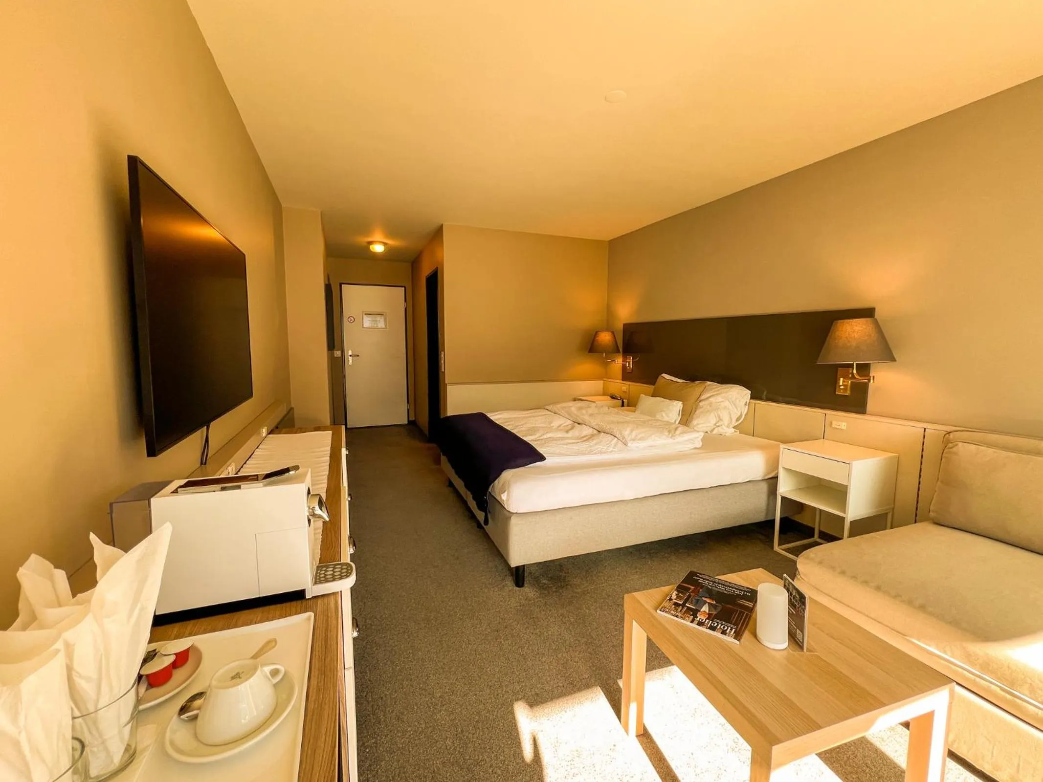 Bed in Seehotel Riviera at Lake Lucerne