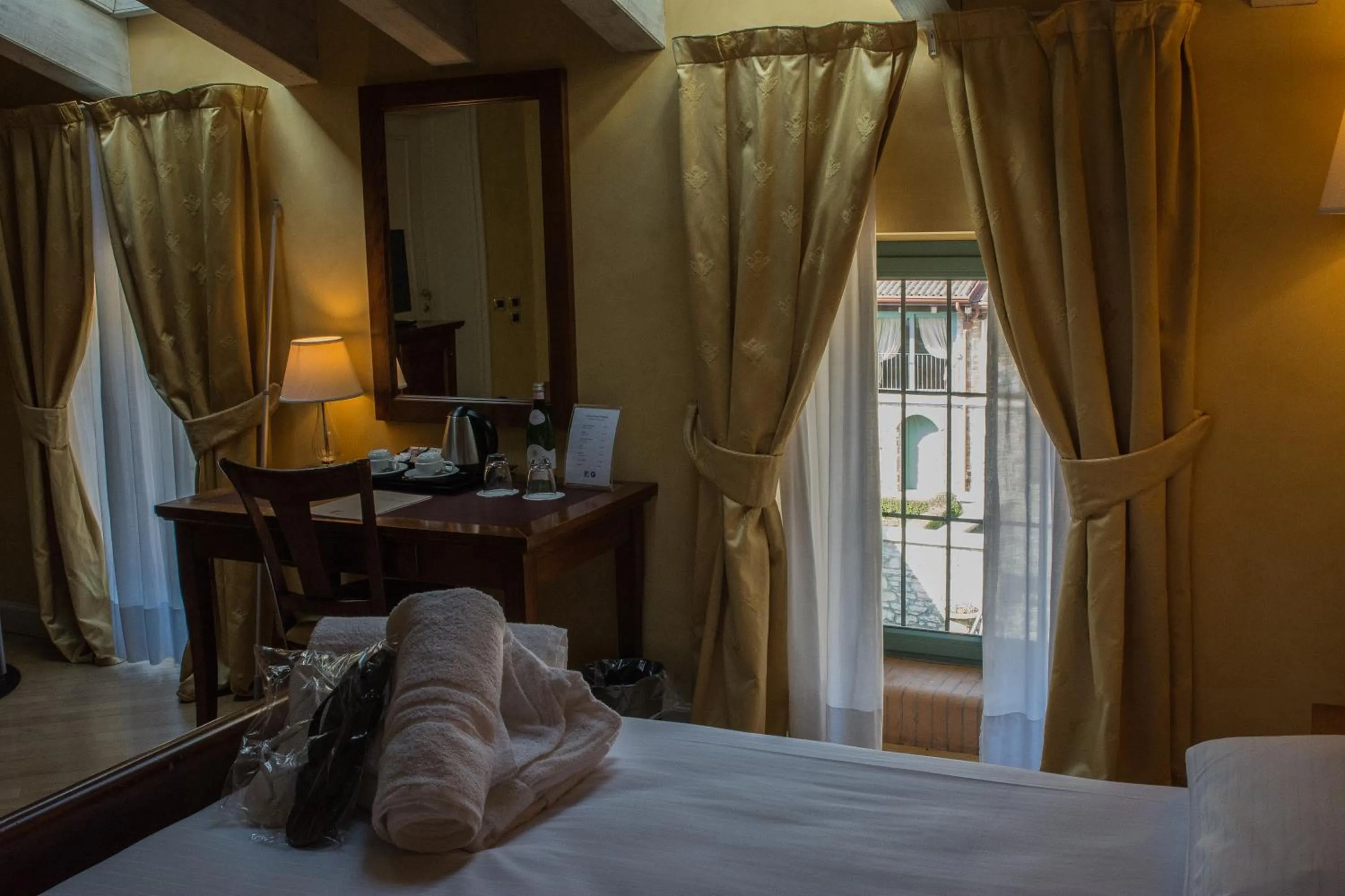 Bed in Relais La Colombara Spa & Wellness