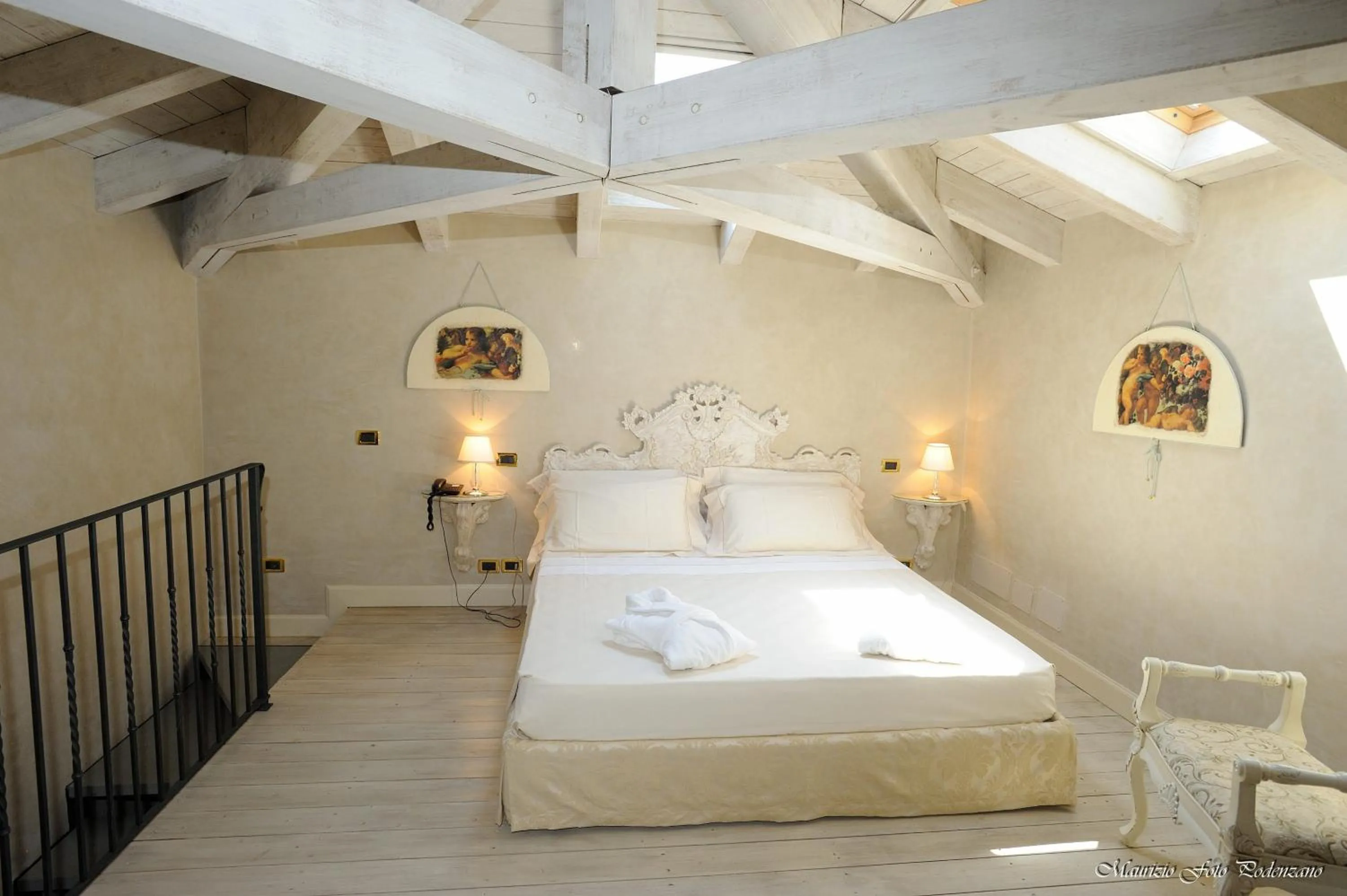 Bed in Relais La Colombara Spa & Wellness