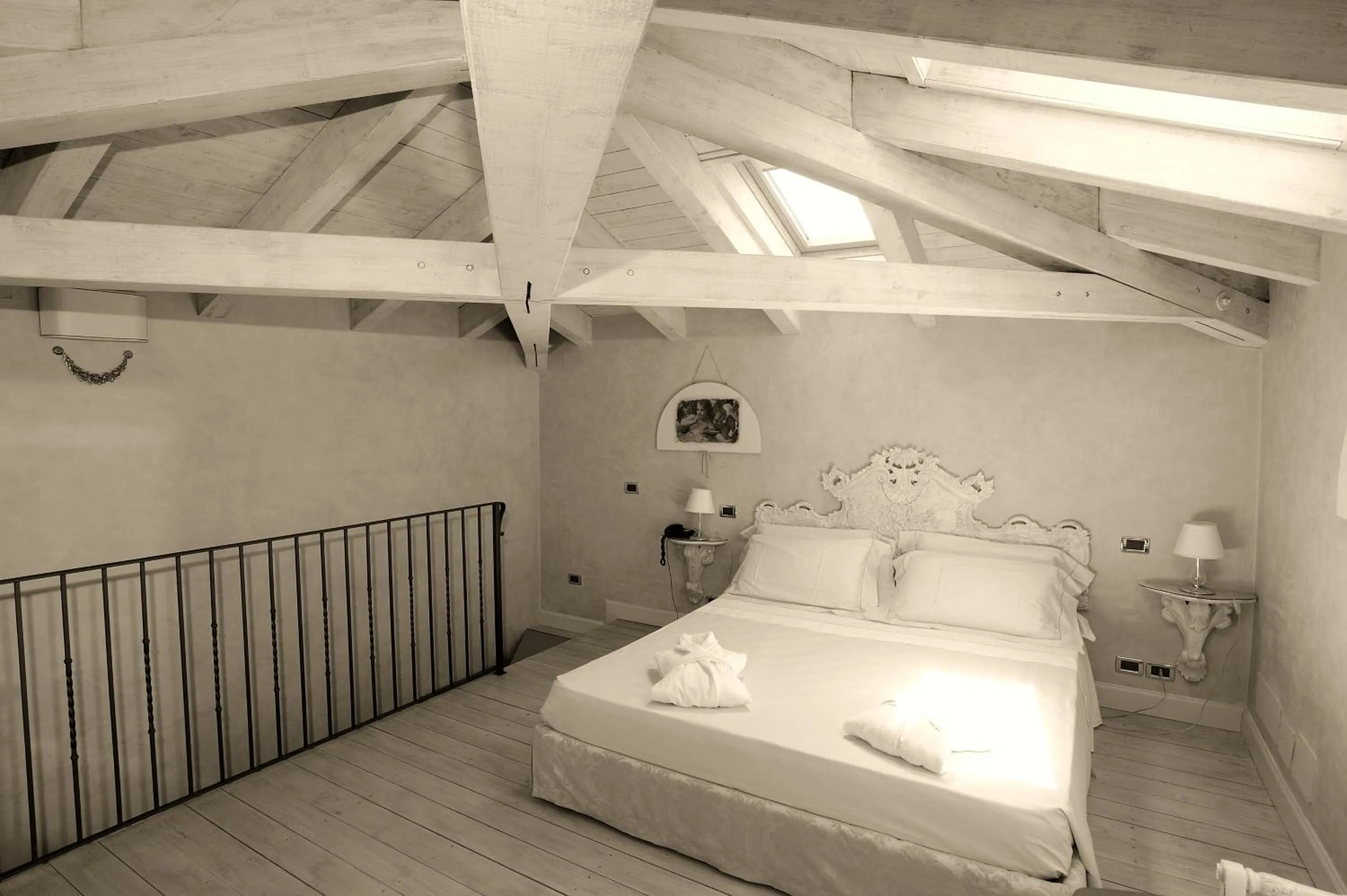 Bed in Relais La Colombara Spa & Wellness