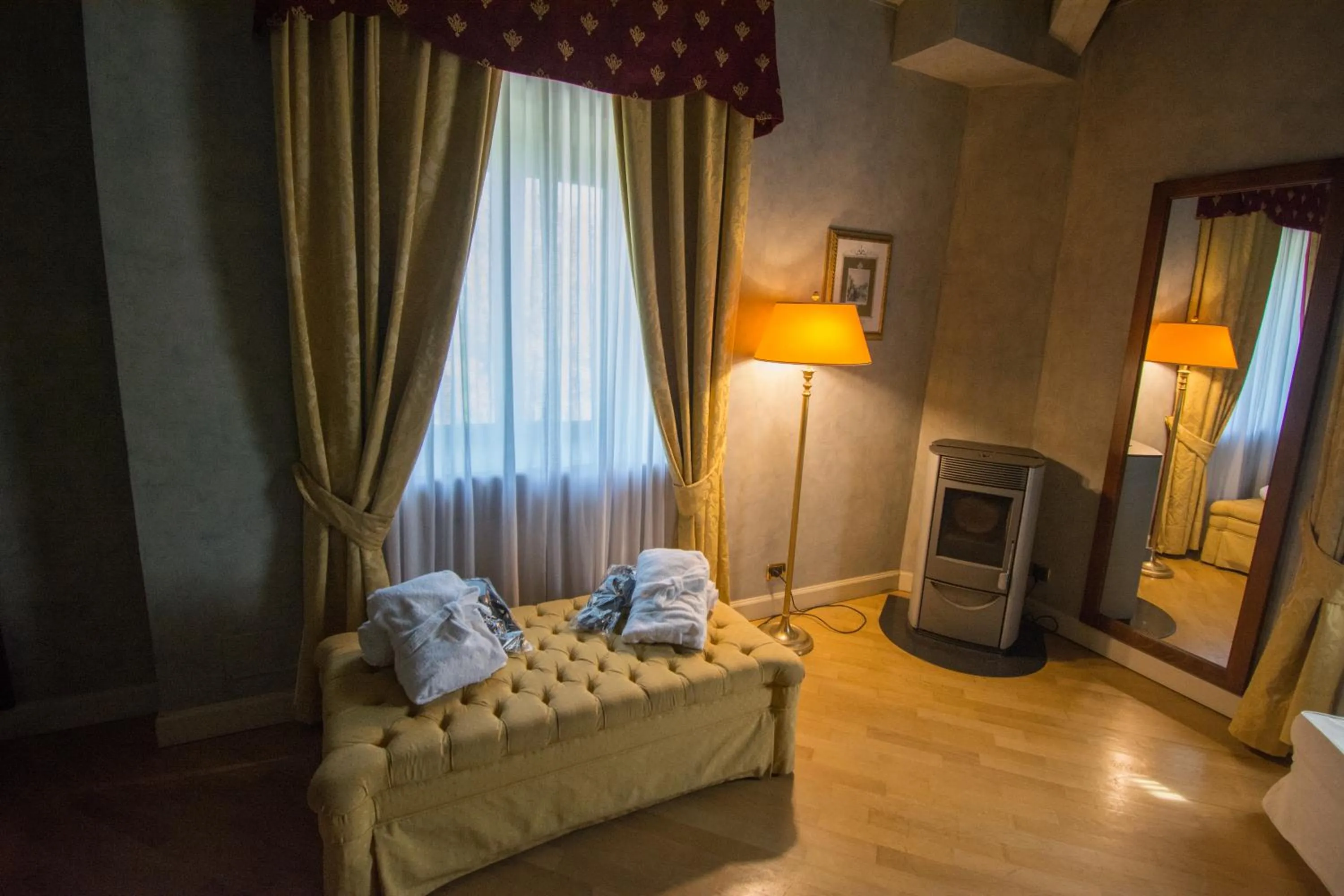 Bed in Relais La Colombara Spa & Wellness