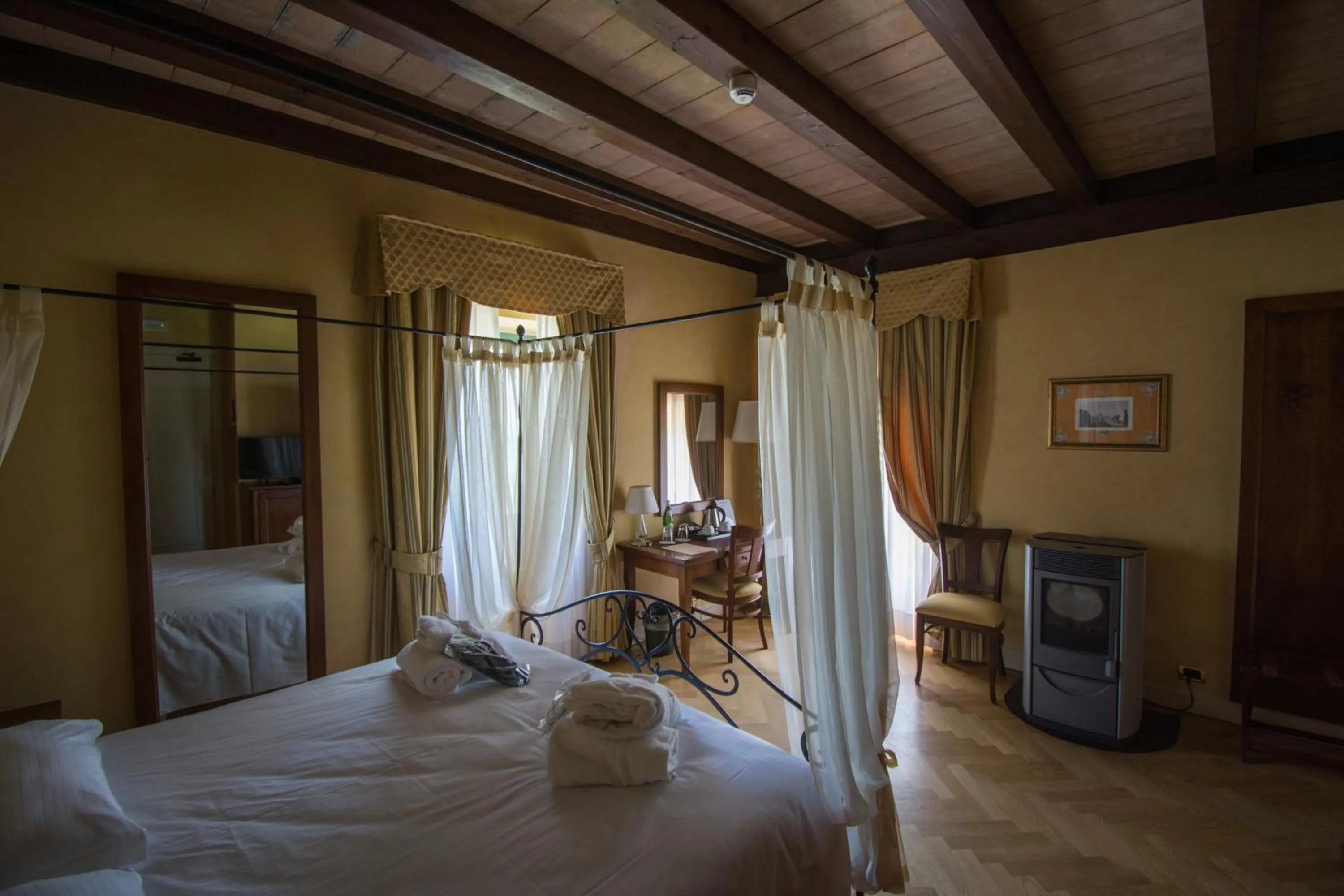 Bed in Relais La Colombara Spa & Wellness