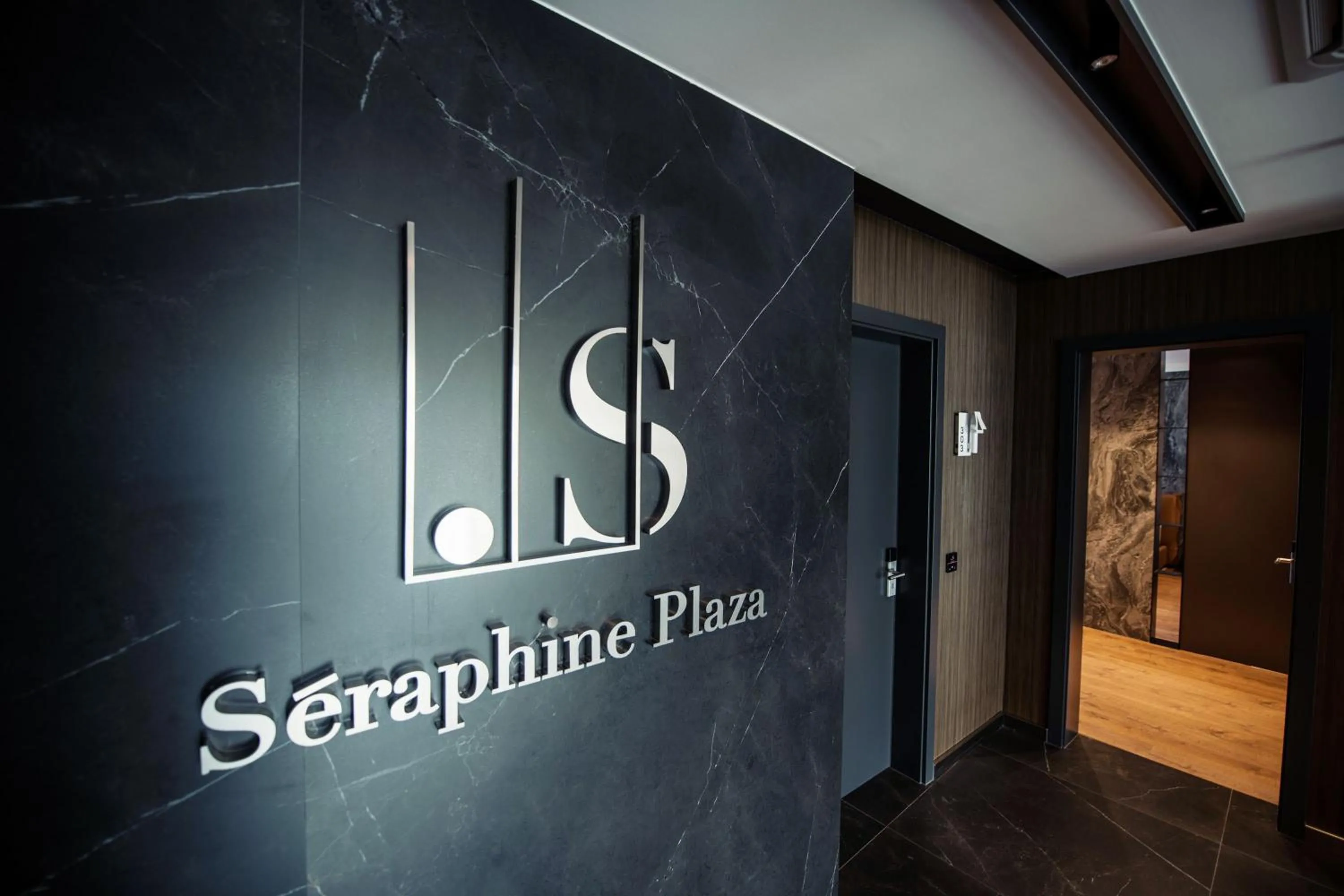 Property logo or sign in Seraphine Plaza