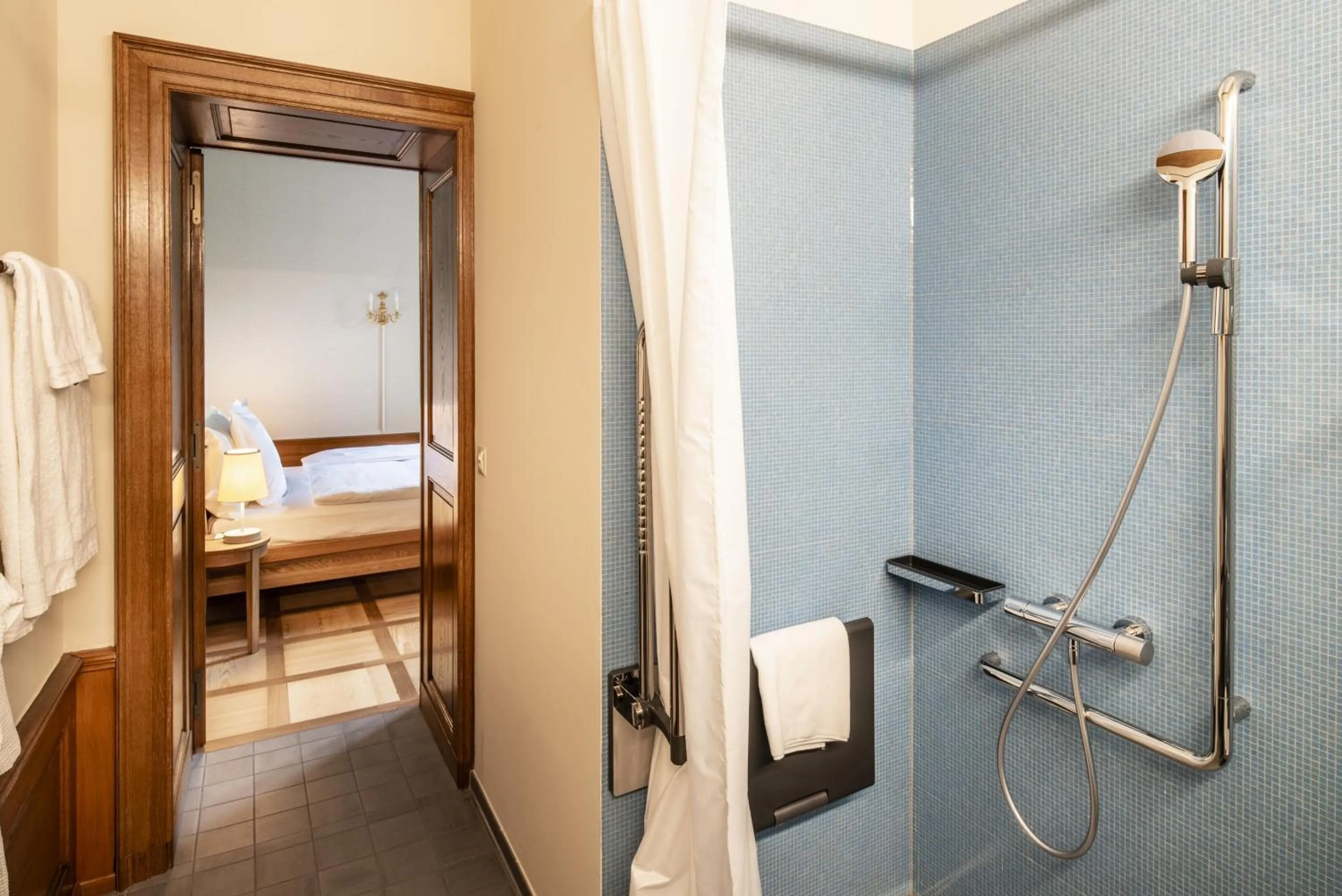 Bathroom, Bed in Schloss Schadau - Swiss Historic Hotel