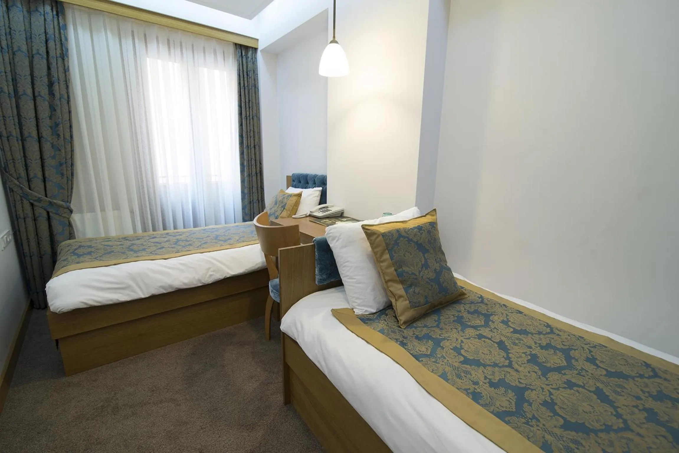 Bed in Cumbali Suite Hotel