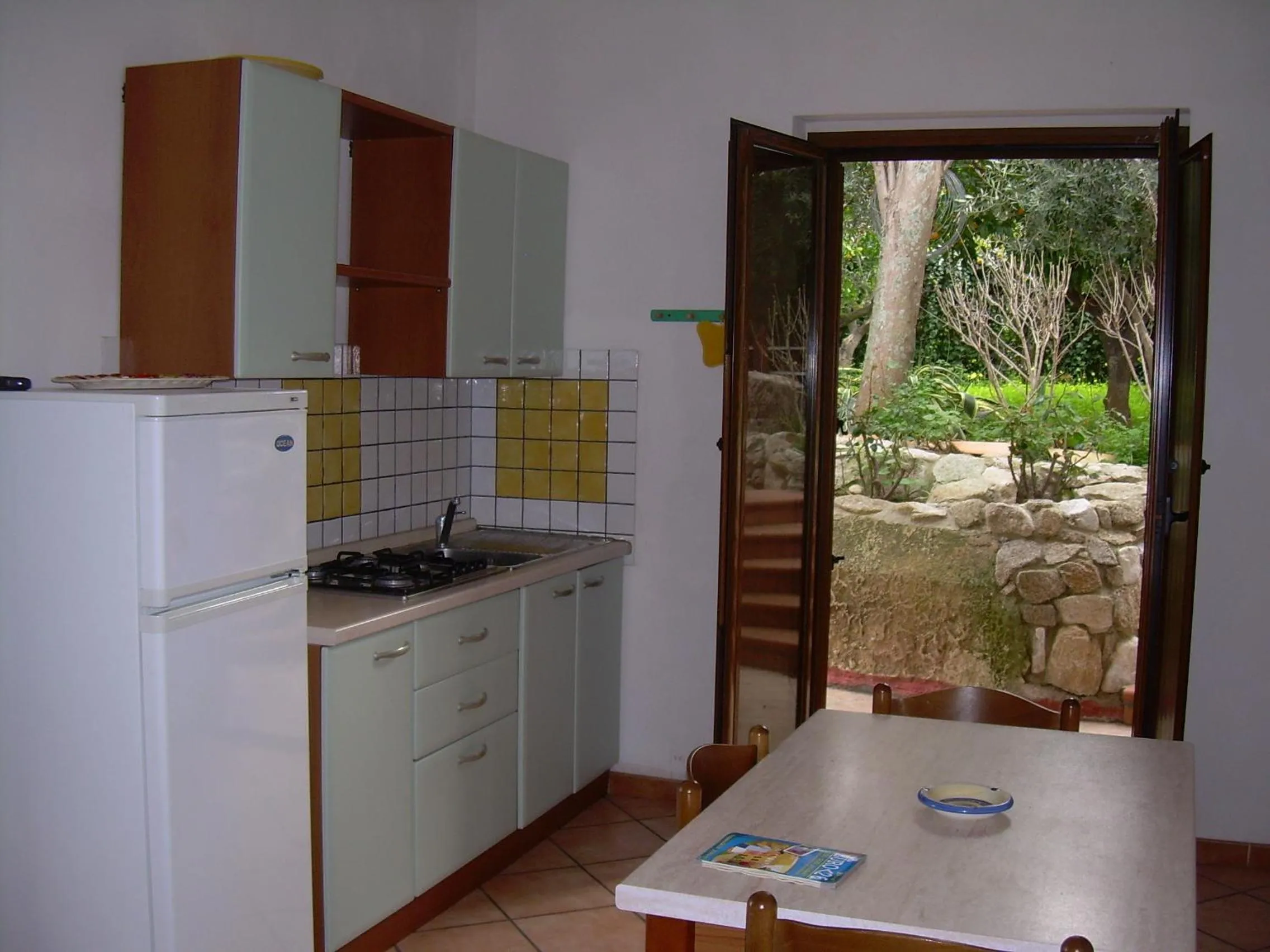 Kitchen or kitchenette in Appartamenti Pousada Michelino