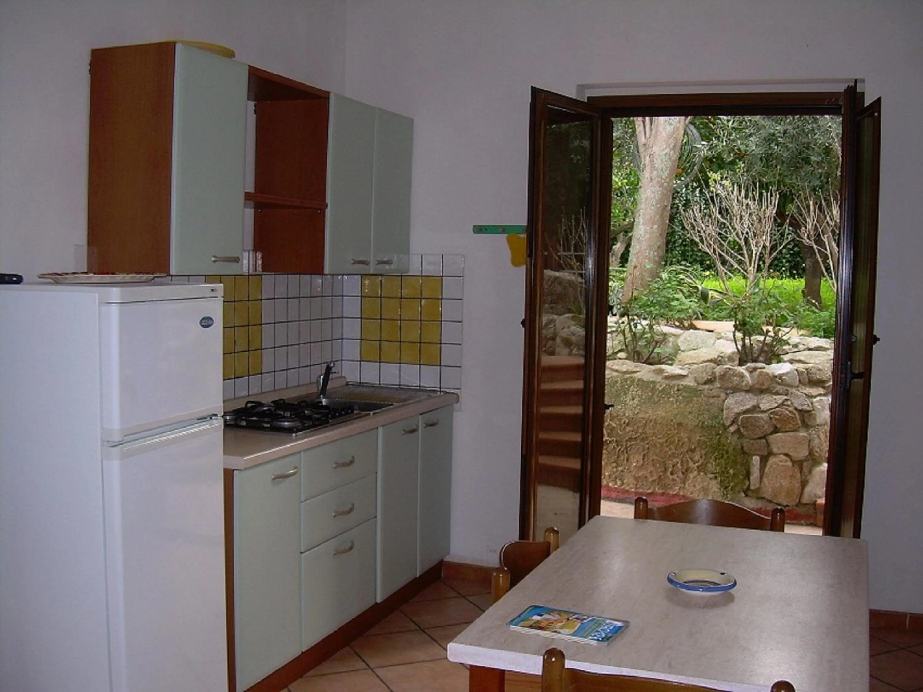 Kitchen or kitchenette in Appartamenti Pousada Michelino
