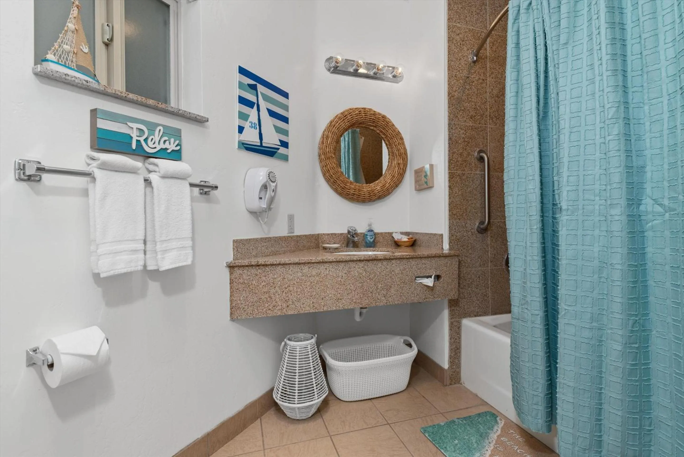 Bathroom in Beach House Inn & Suites