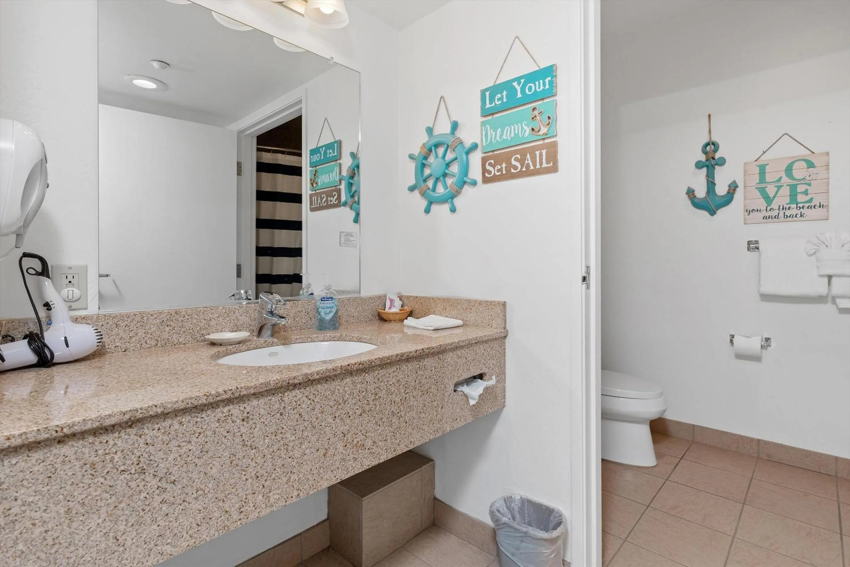 Bathroom in Beach House Inn & Suites