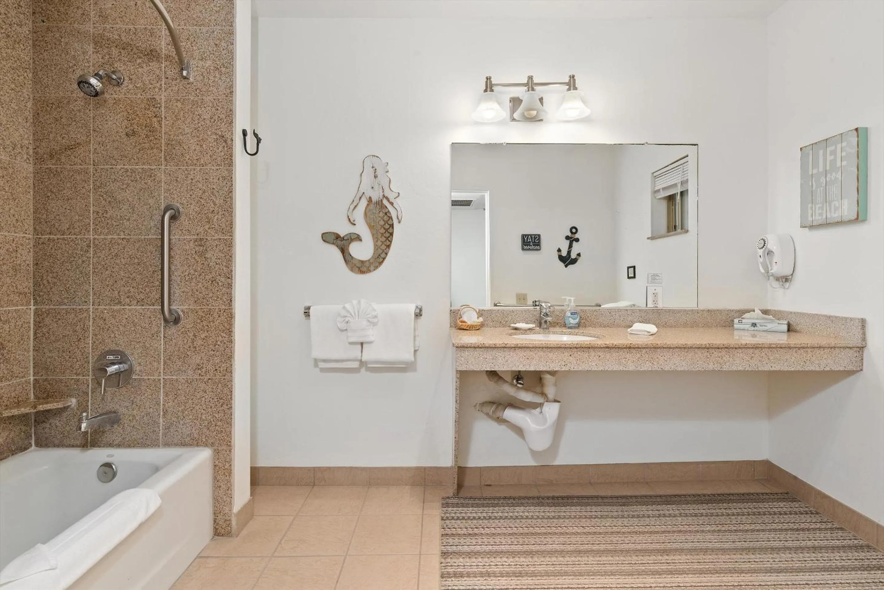 Bathroom in Beach House Inn & Suites