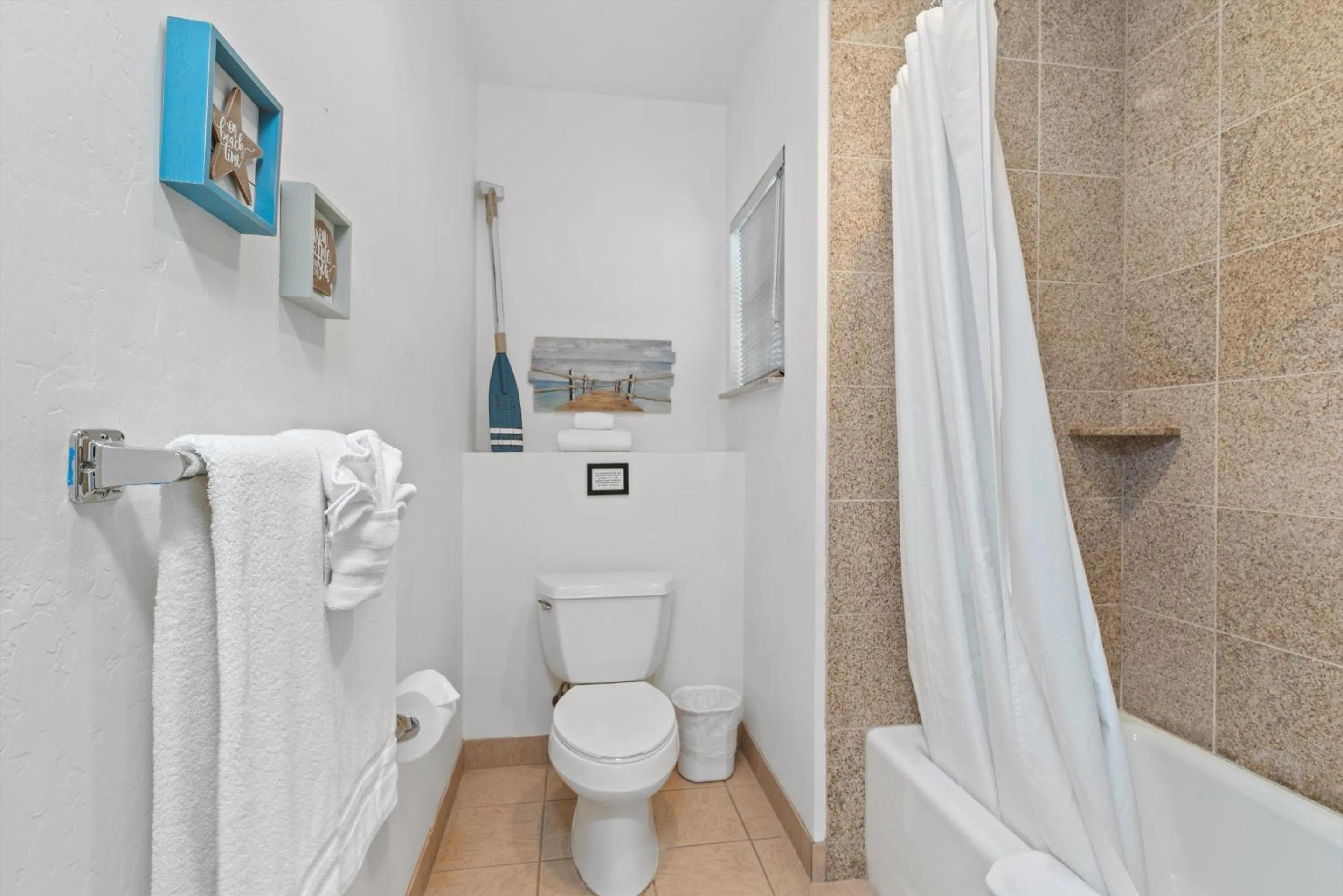 Bathroom in Beach House Inn & Suites