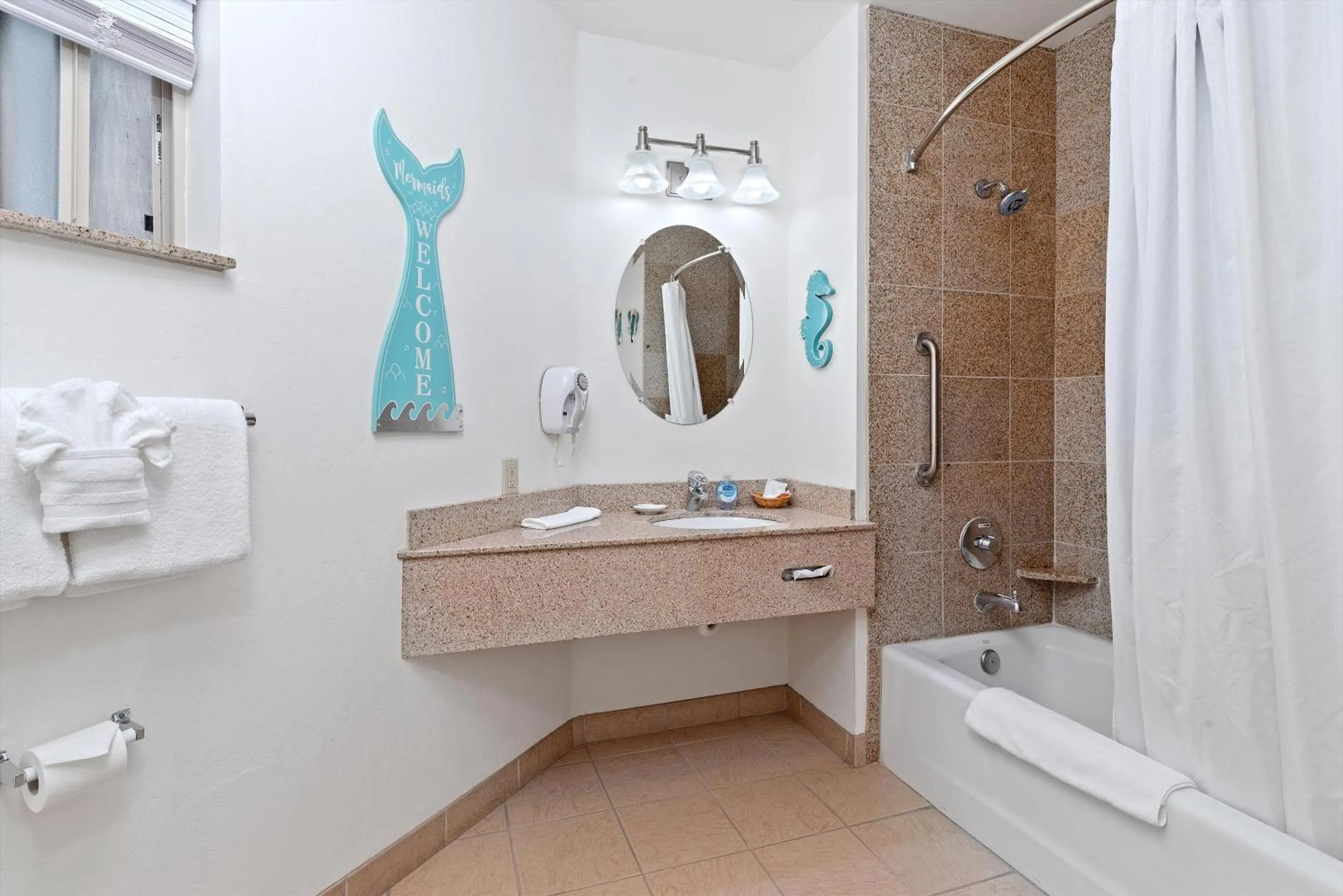 Bathroom in Beach House Inn & Suites