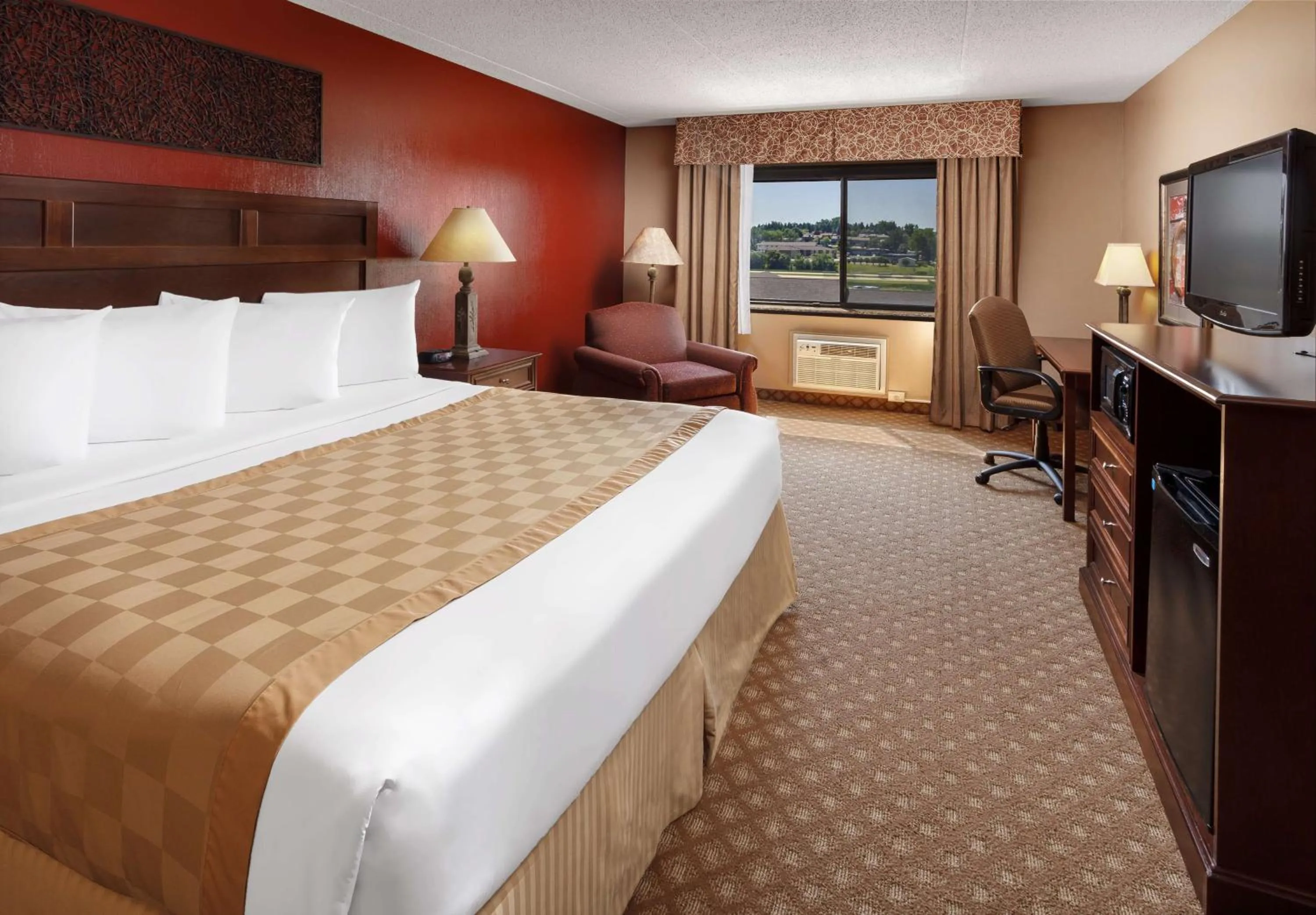 Bedroom, Bed in Roosevelt Grand Dakota SureStay Collection by Best Western