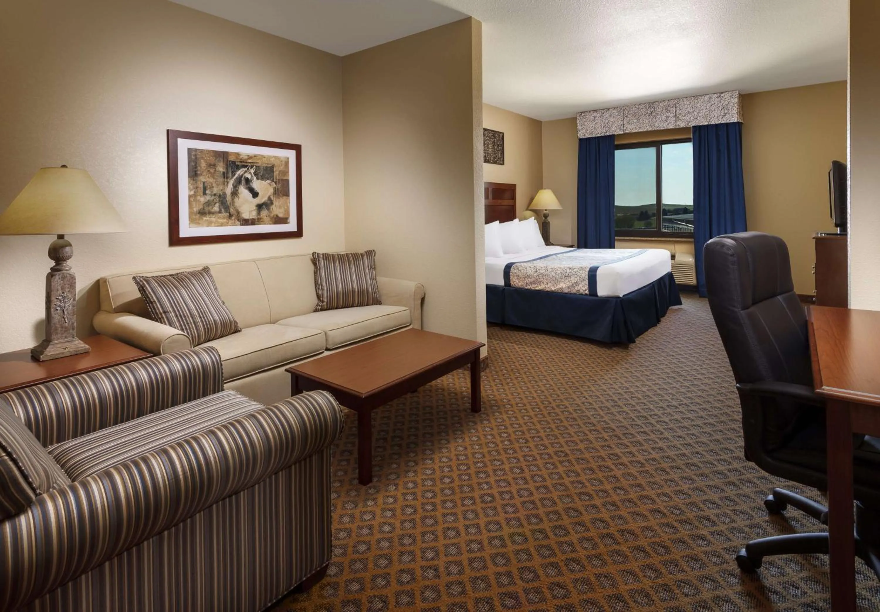 Photo of the whole room, Bed in Roosevelt Grand Dakota SureStay Collection by Best Western