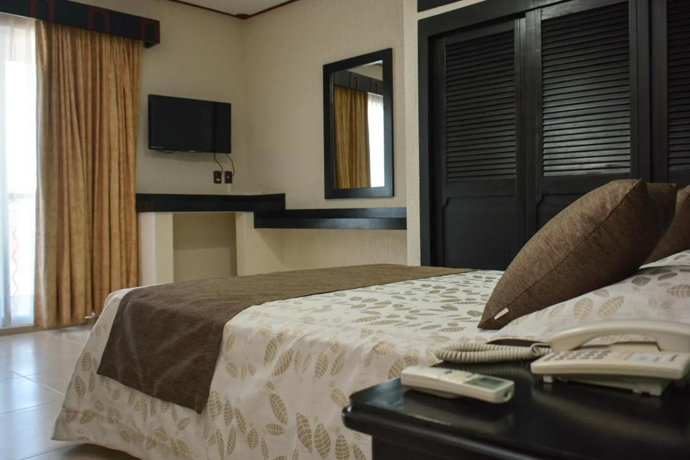 Bed in Suites Los Arcos