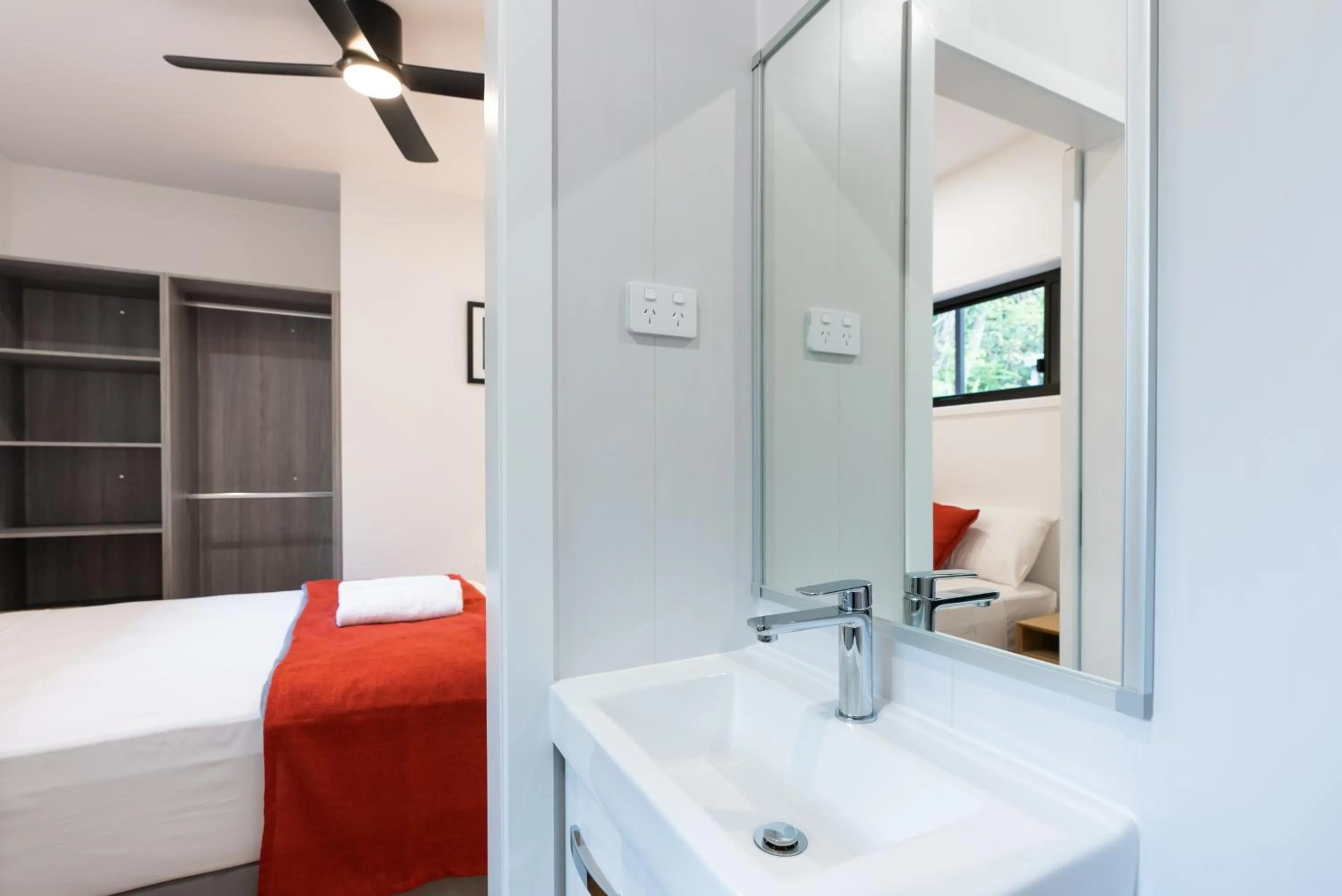 Bed in Kipara Tropical Rainforest Retreat