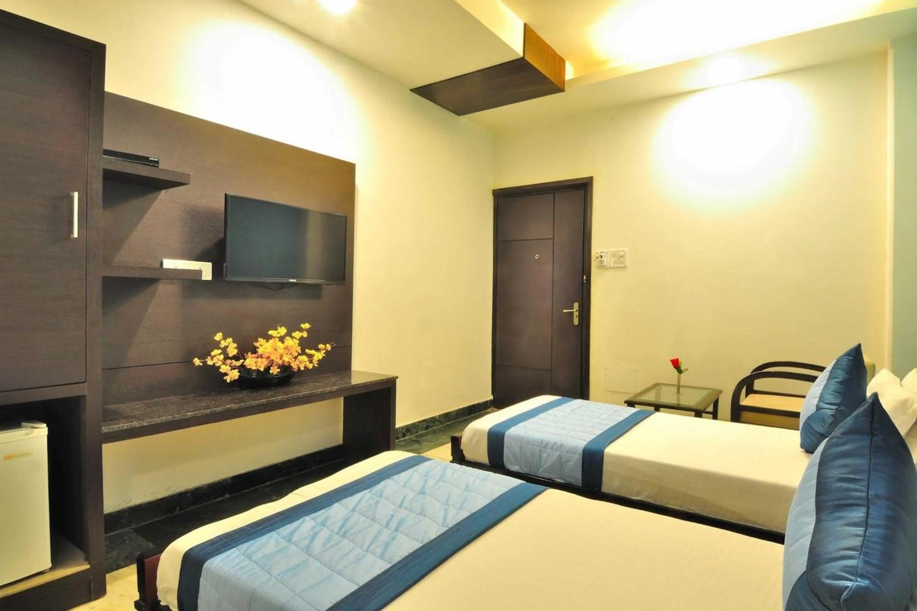 Bedroom in FabHotel Arihant Inn