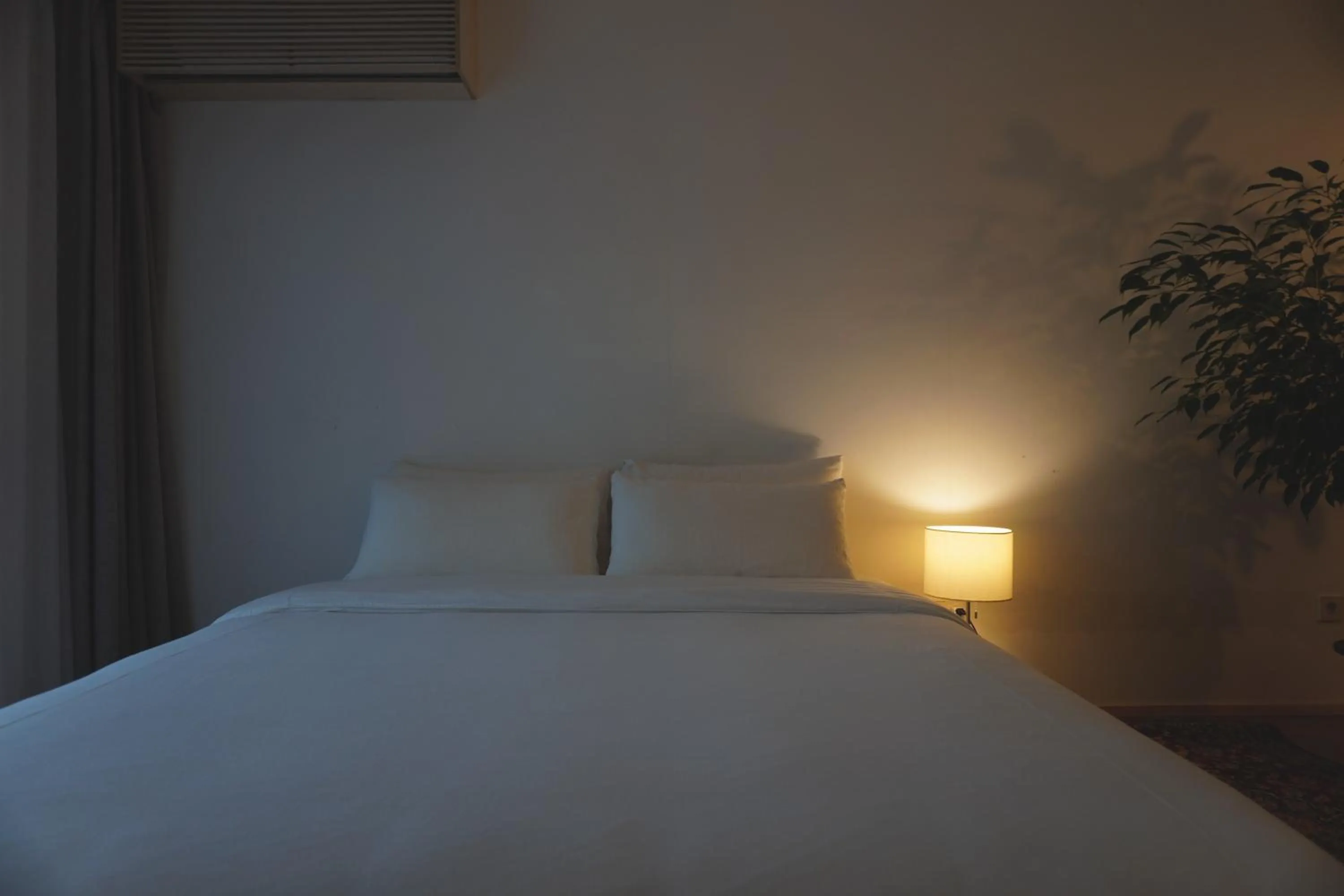 Bed in At corner resort & garden