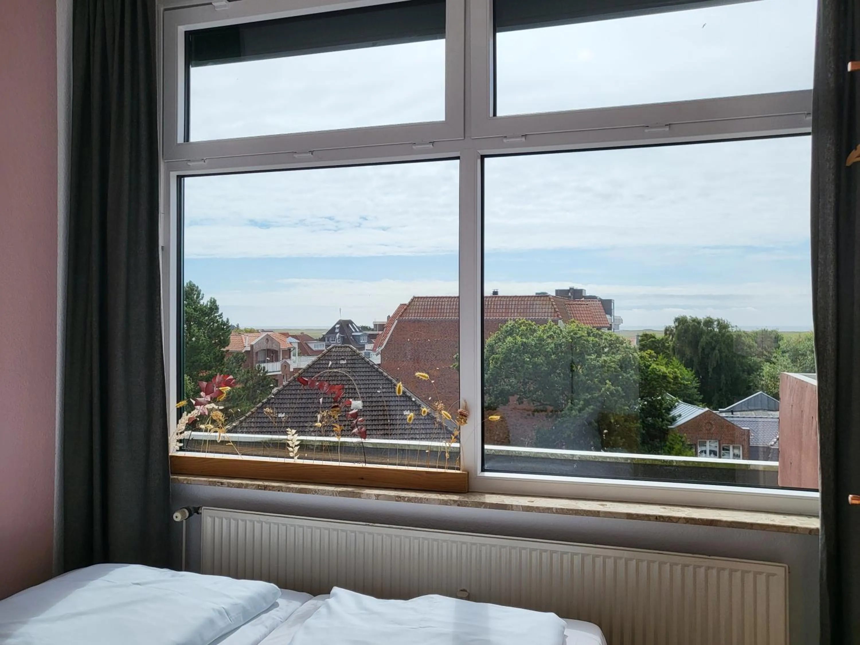 Bed in Penthousewohnung 66 im Haus Villa Anna