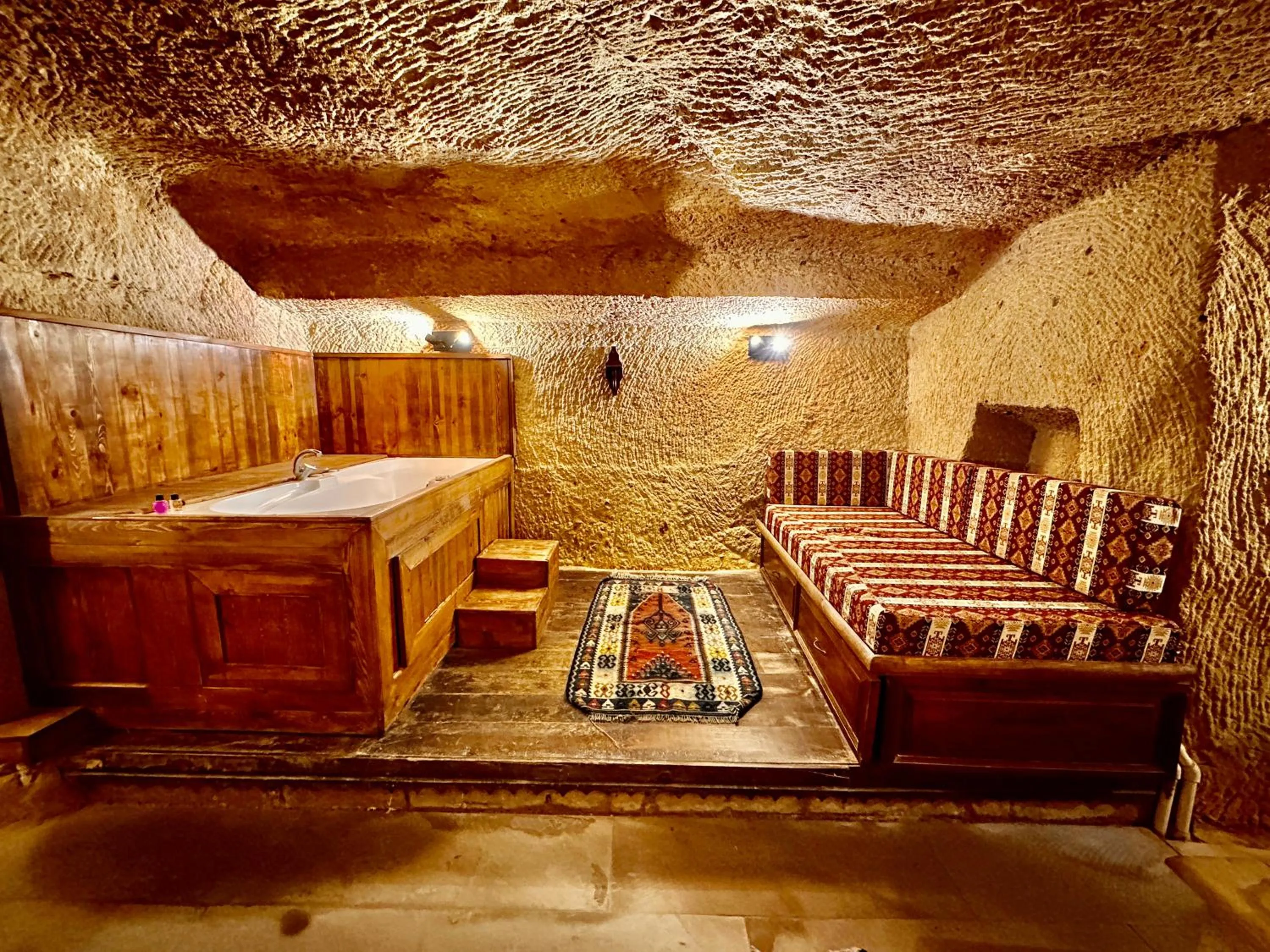 Bed in Harkasos Cave Hotel