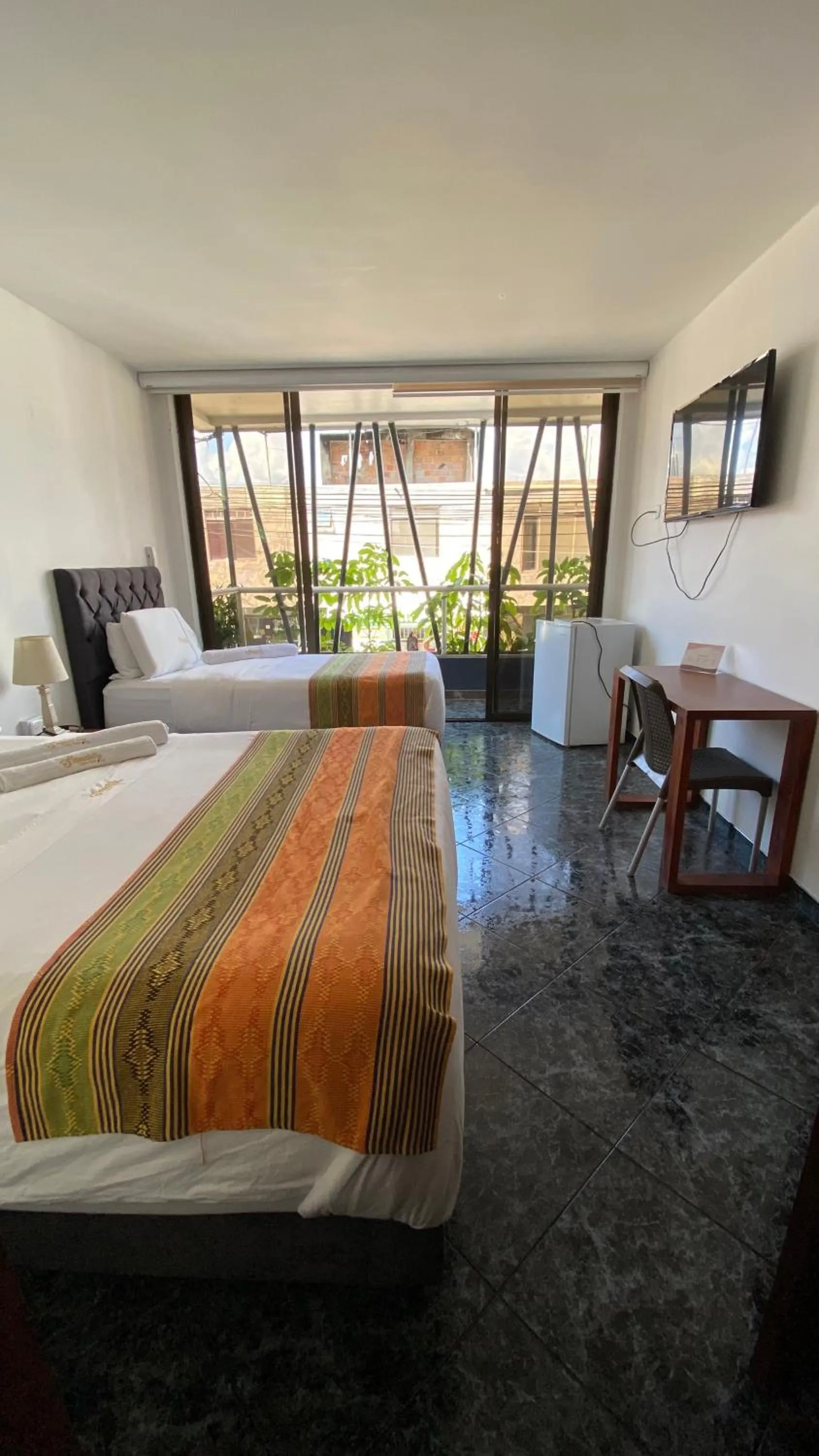 Bed in Samalá Casa Hotel